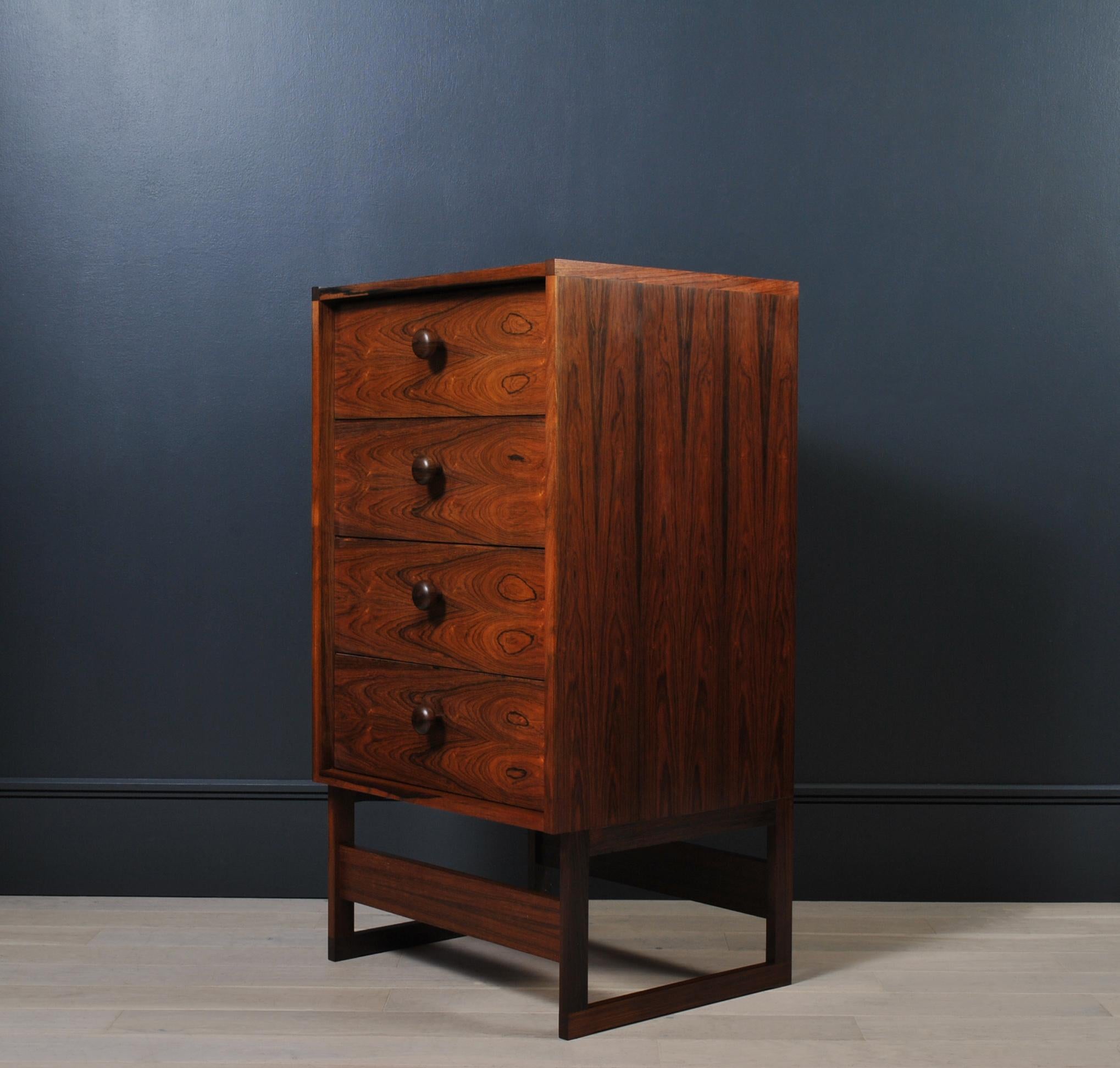 Highly unusual and larger than its appearance tallboy chest of drawers. Idiosyncratic Modernist design from Denmark circa 1960. Extremely well made with lovely turned knobs and dovetail jointed drawers.