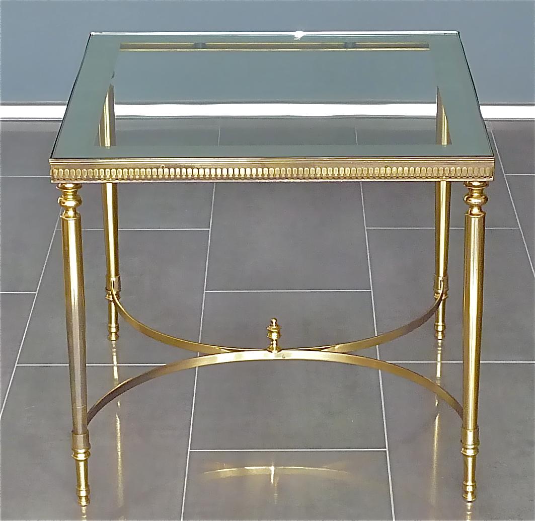 Large pair of elegant French Maison Baguès patinated brass and mirrored glass side, sofa, couch or end tables, Paris France circa 1950-1960. The heavy and high quality side tables comparable to Maison Jansen and Maison Charles are 54 cm / 21.26
