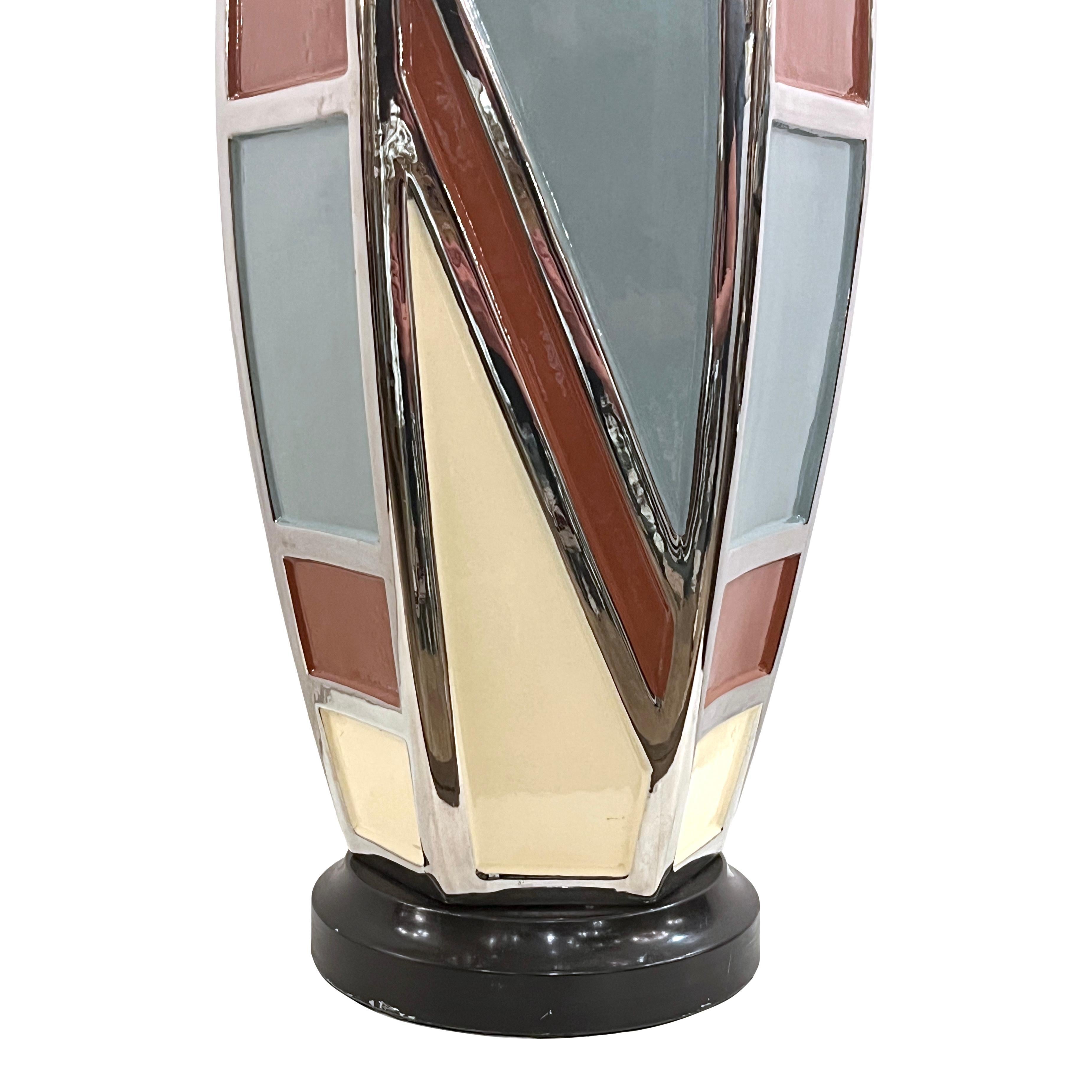 A circa 1960's Italian porcelain geometric lamp.

Measurements:
Height of body: 19