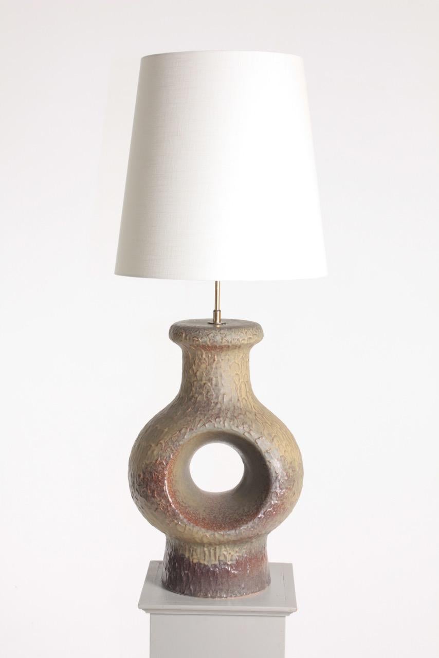 Large artefact table lamp handmade and designed in Denmark in late 1960s.
Comes with new lampshade.
