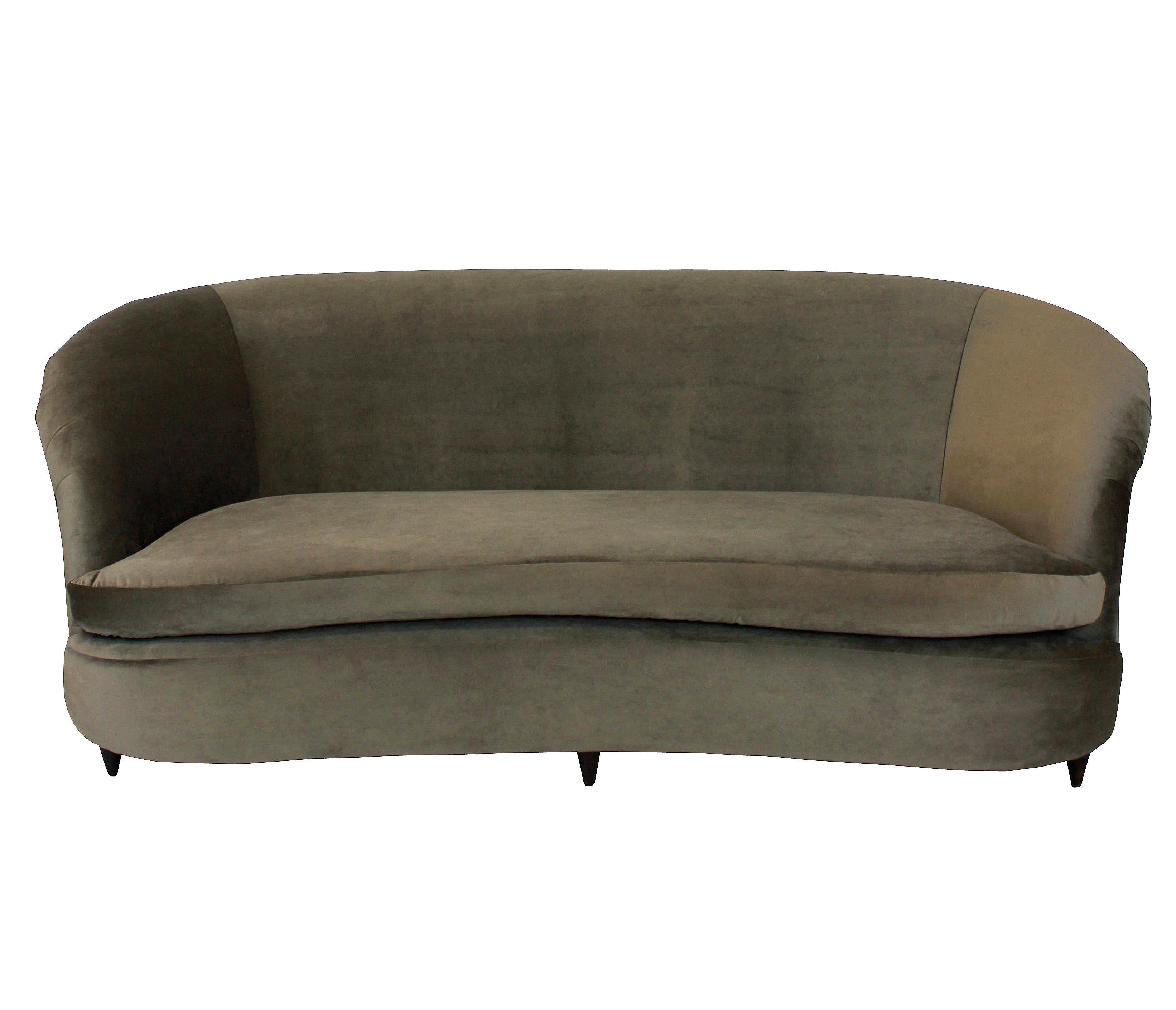 A large three-seat, extremely comfortable sculptural settee by Parisi, with swab cushion and newly upholstered in mole velvet.

   