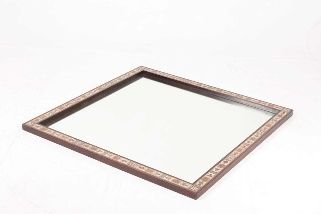 Large wall mirror, frame in rosewood decorated with tiles by Royal Copenhagen. Designed by Severin Hansen and made by Haslev Furniture Denmark. Great original condition, circa 1960.
