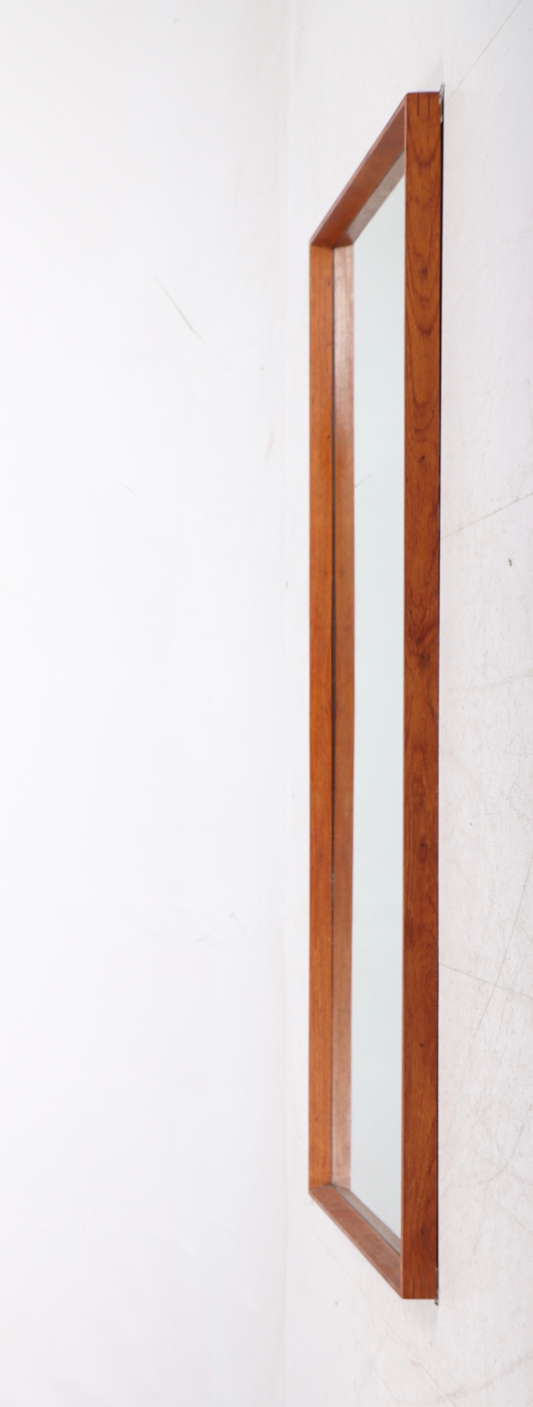 Largee wall mirror in teak, designed and made in Sweden. Great original condition.