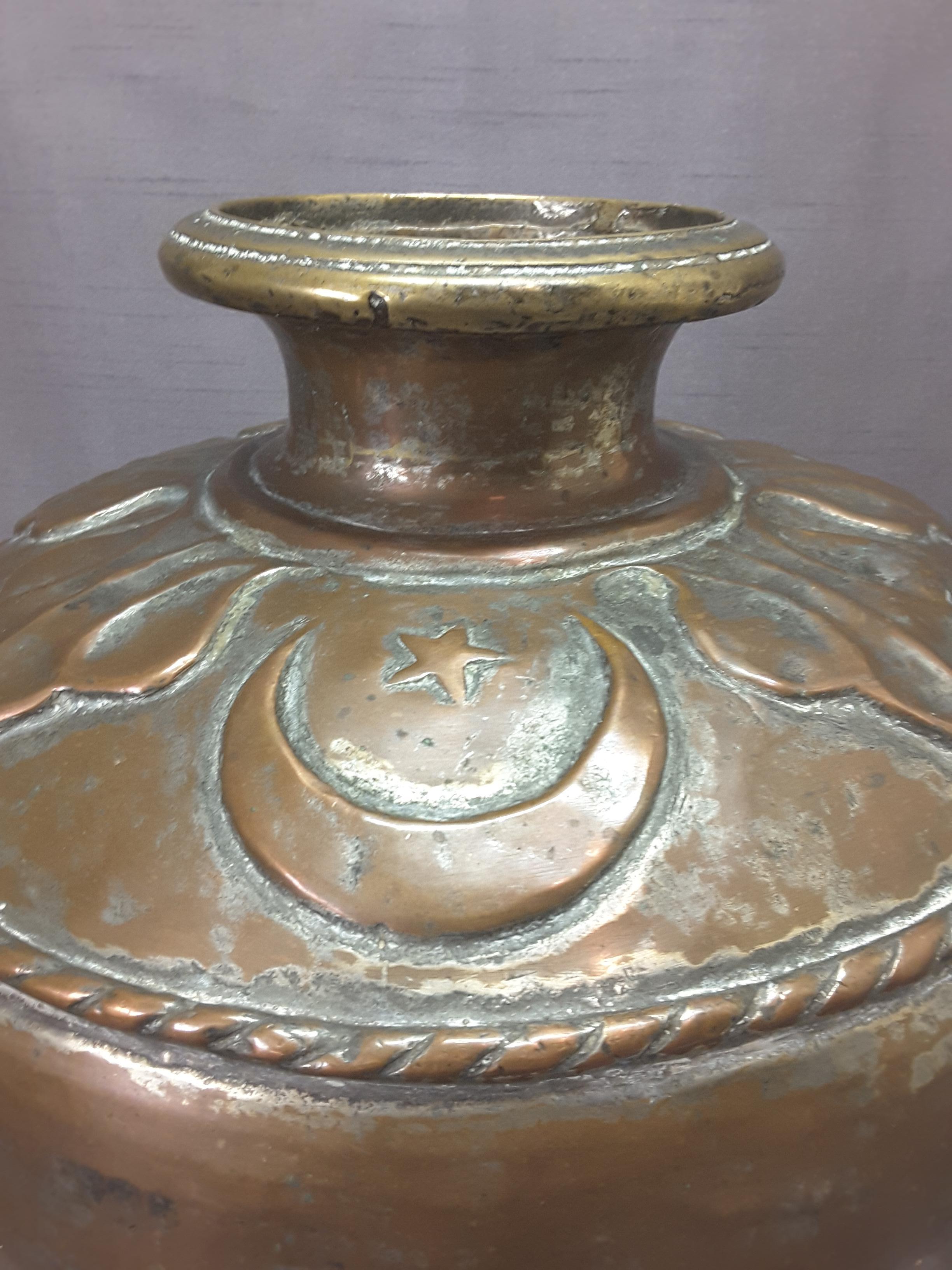 Large Middle Eastern Tinned Copper Water Vessel, 19th Century, Decorated with rope twist rim, Turkish Sicle and Star, Bordered with a stylized leaf pattern rim. Dove tailed copper jointed construction, extremely well made and usable. Probably dates
