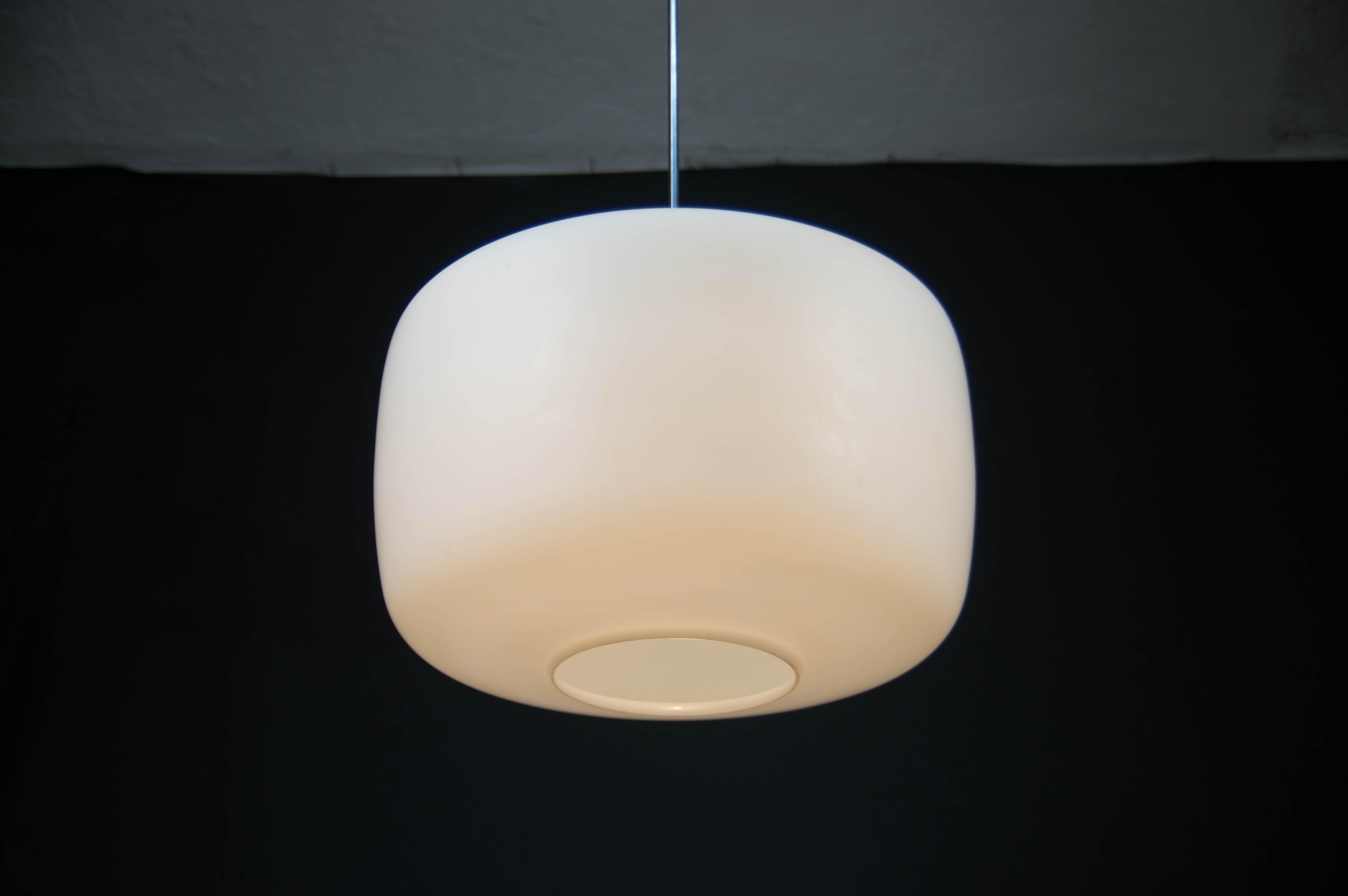 Big white opaline glass shade.
Made in Czechoslovakia in 1960s.
Eye-catching design piece.
1x100W, E25-E27 bulb
US wiring compatible
The length of the central rod on demand.