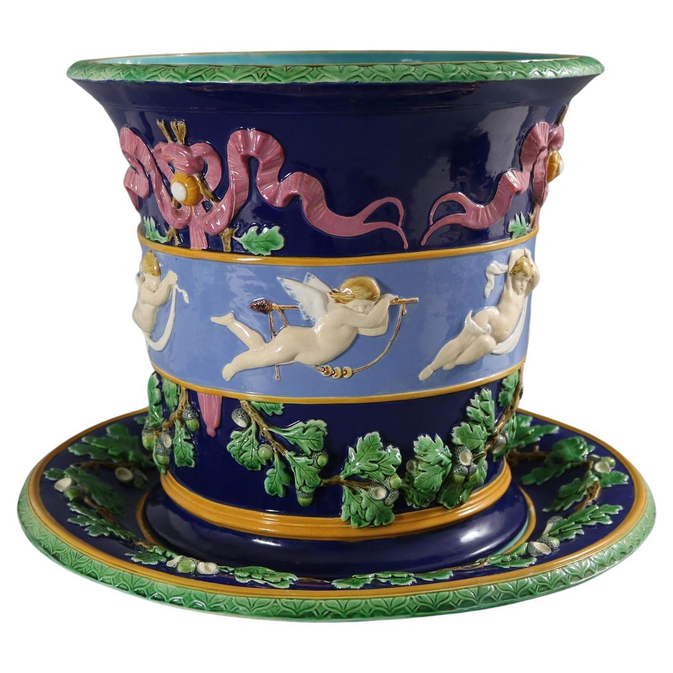 Large Minton Majolica Cupids Jardiniere And Stand For Sale