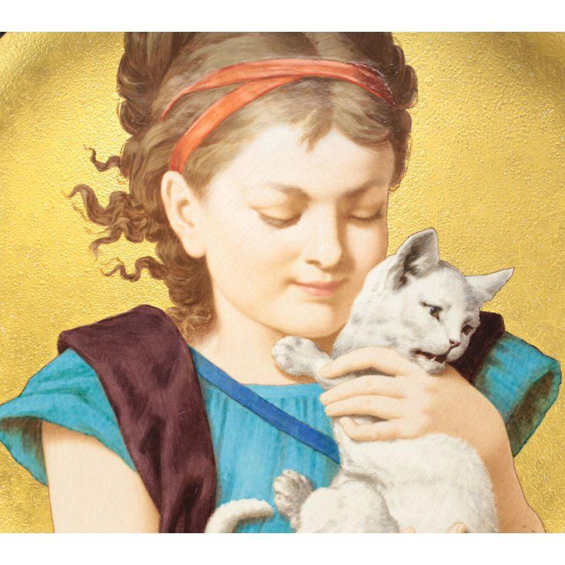 Large Minton Porcelain Wall Charger by Herbert Wilson Foster Girl with Cat, 1880

A large Minton porcelain hand painted wall charger, 1880. The finely hand painted charger charmingly depicts a young girl holding a cat with a gilt textured
