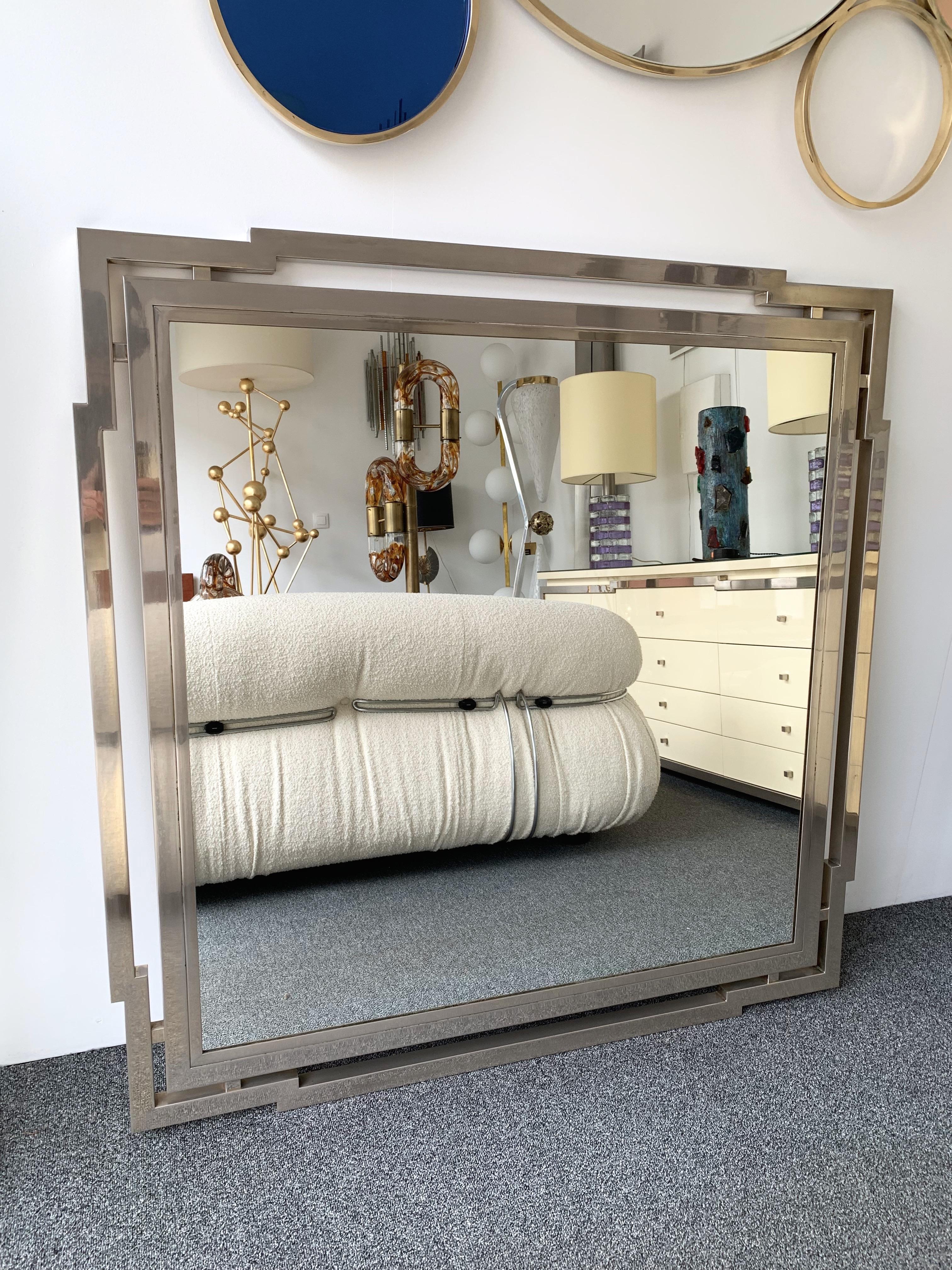 Large square geometrical wall mirror metal chrome, full heavy metal, high quality from the 1970s by Mario Sabot. Famous manufacture like Maison Jansen, Galerie Maison et Jardin, Willy Rizzo, Romeo Rega, Belgo chrome, Hollywood Regency.