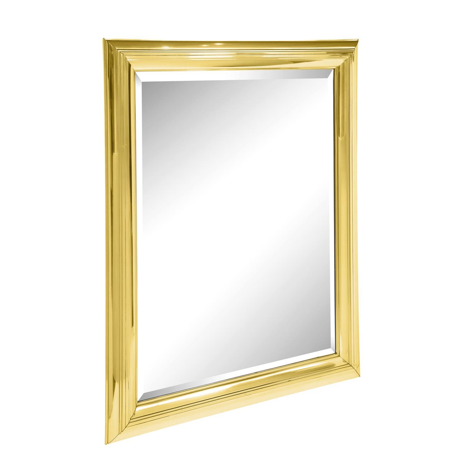 Large Artisan mirror with molded polished brass frame and mirror with bevel, American 1970's. This mirror is beautifully made and very chic.