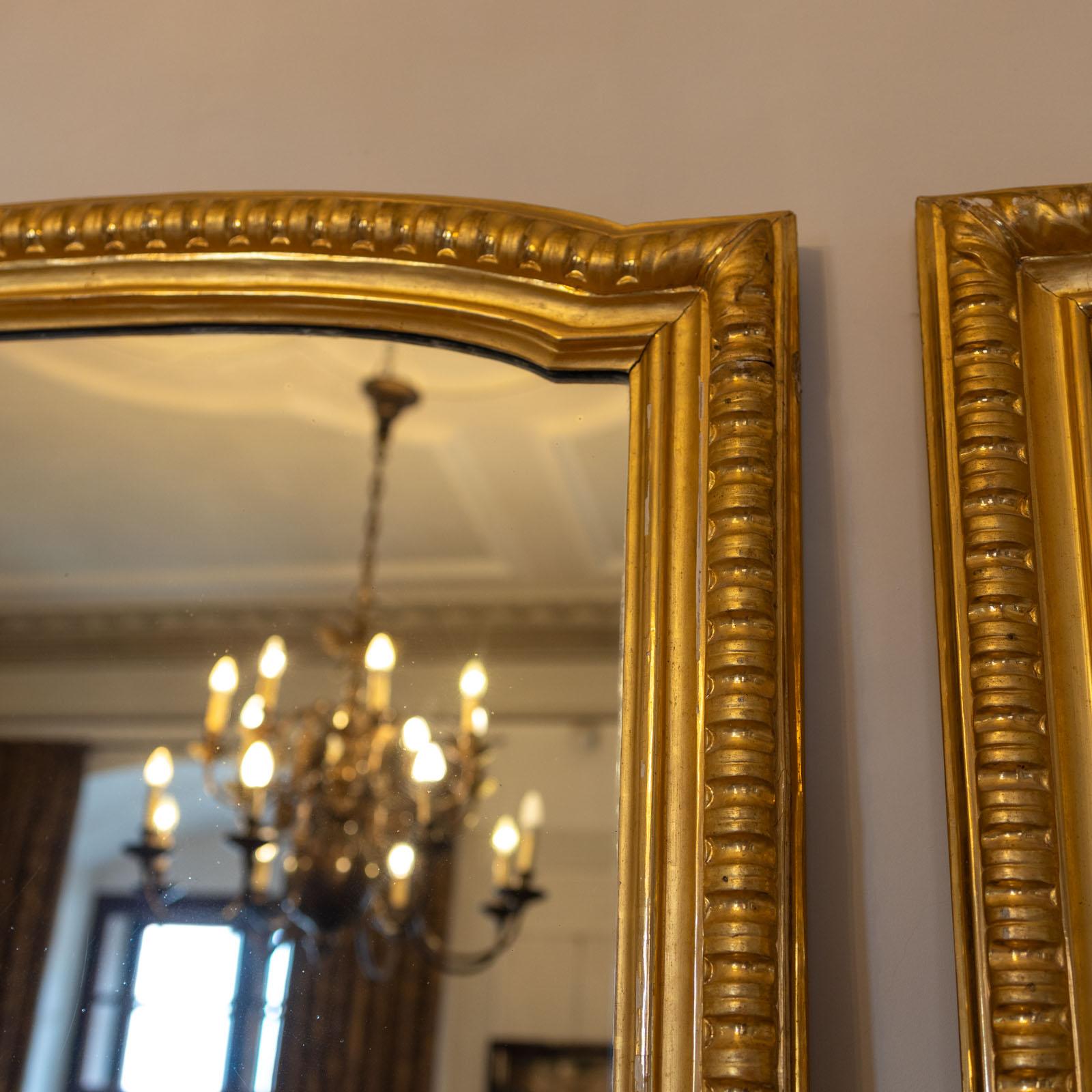 Italian Large Mirrors in a gold-patinated frame, Italy Mid-19th century