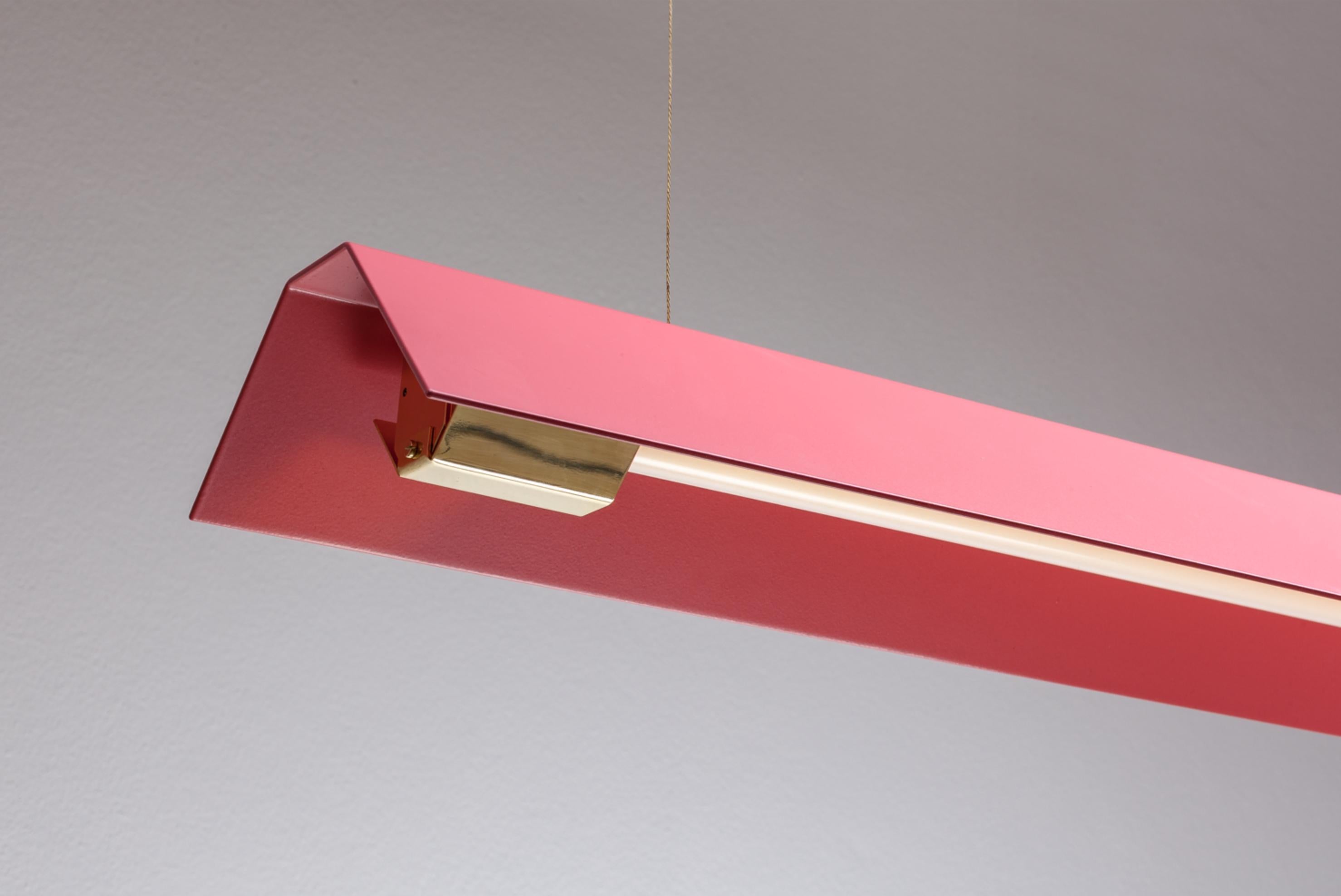 Large Misalliance Ex antique pink suspended light by Lexavala
Dimensions: D 16 x W 130 x H 8 cm
Materials: powder coated shade with details made of brass or stainless steel.

There are two lenghts of socket covers, extending over the LED. Two