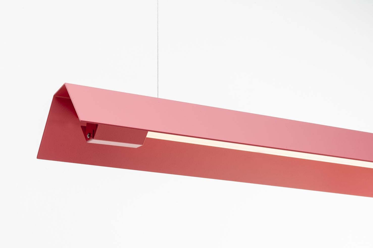 Large Misalliance ral antique pink suspended light by Lexavala
Dimensions: D 16 x W 130 x H 8 cm
Materials: powder coated aluminium.

There are two lenghts of socket covers, extending over the LED. Two short are to be found in Suspended and