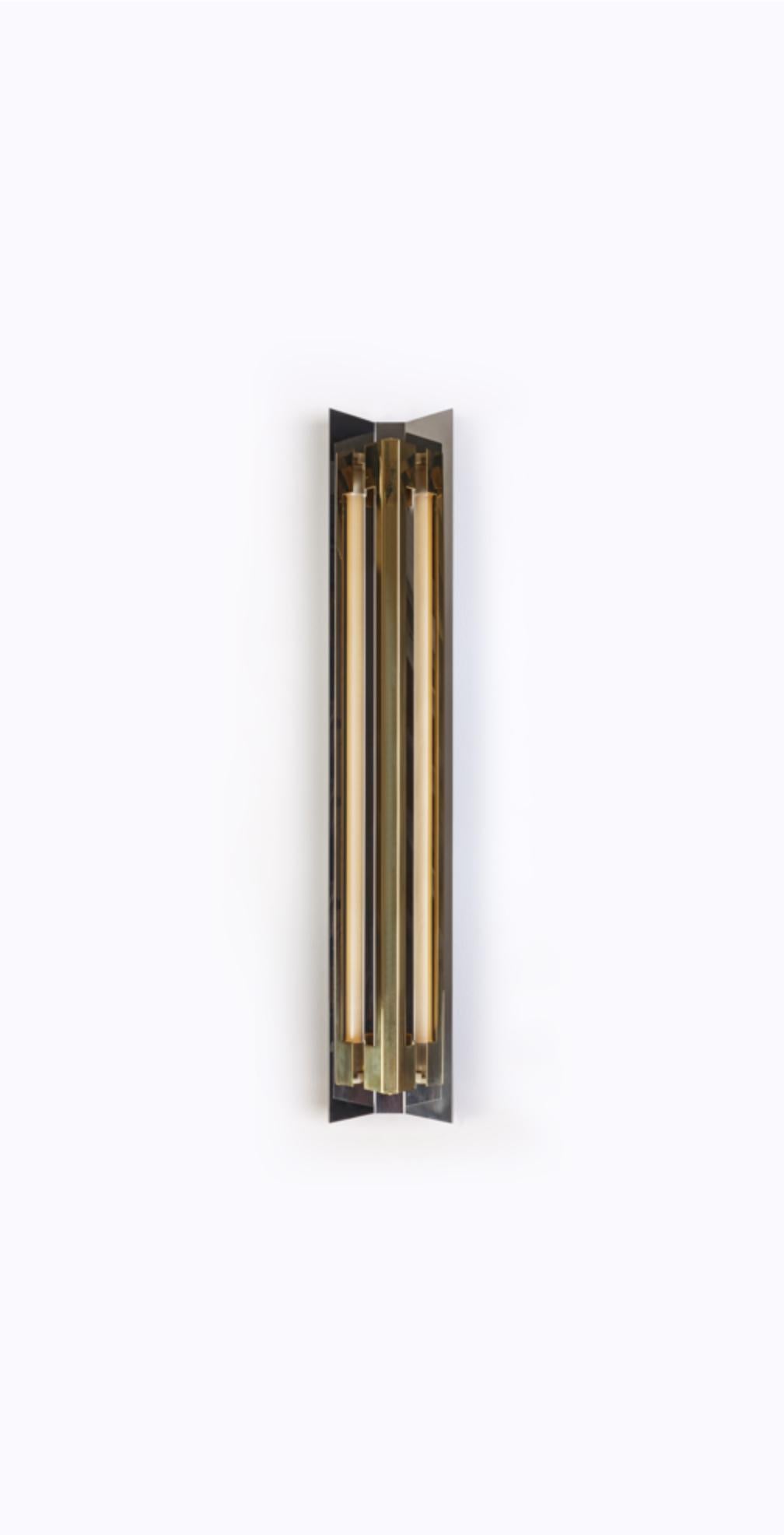Large Misalliance Solid Brass Wall Light by Lexavala
Dimensions: D 16 x W 130 x H 8 cm
Materials: Brass.

There are two lenghts of socket covers, extending over the LED. Two short are to be found in Suspended and Surface, and one long in the