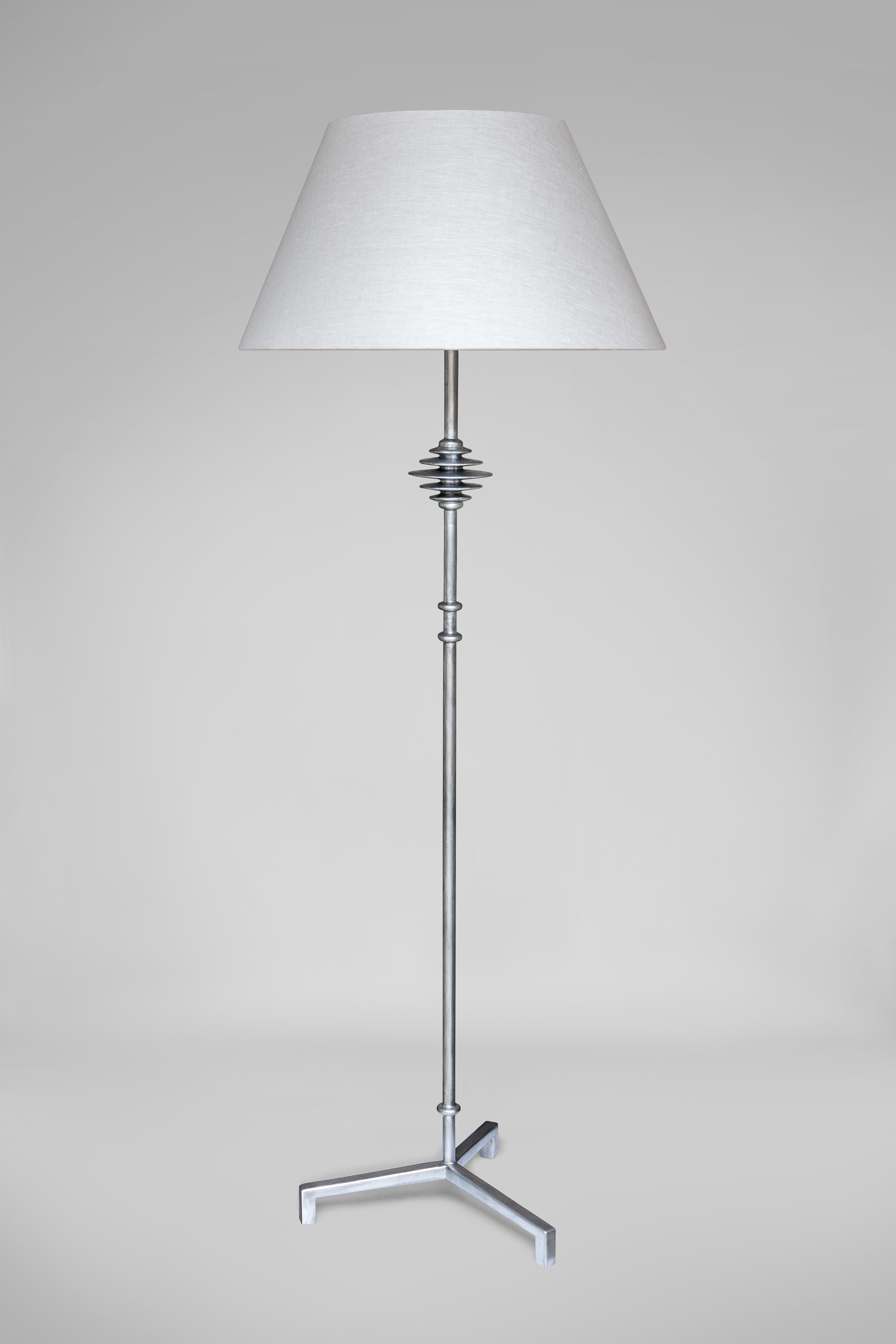 Floor lamp in hand sculpted plaster on metal armature, in the Giacometti Manner.

Lampshade  not included
Recommended Lampshade dimensions: 
Ø 31 top x Ø 55 bottom x H 34 cm / Ø 12,20″ top x Ø 21,65″ bottom x H 13,38″

LAMP 1 x Candelabra bulb / 1 x