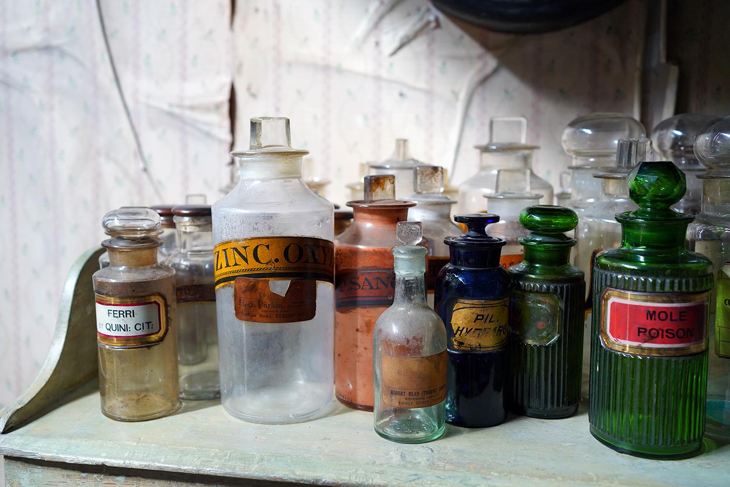 Large Mixed Collection of Forty-Four 19thC-20thC Glass Apothecary Bottles For Sale 1