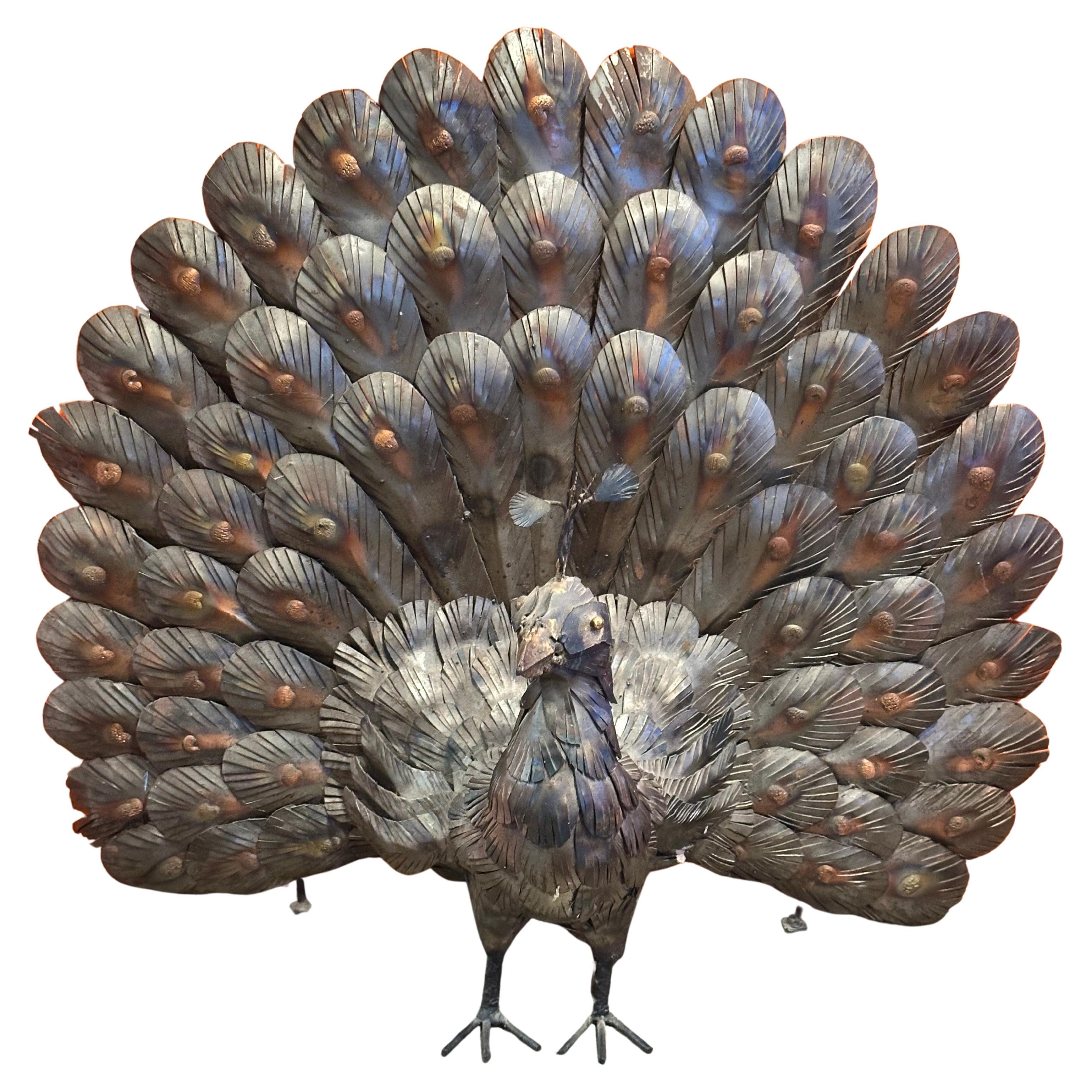 Grande scultura di pavone in metalli misti nello stile di Sergio Bustamante