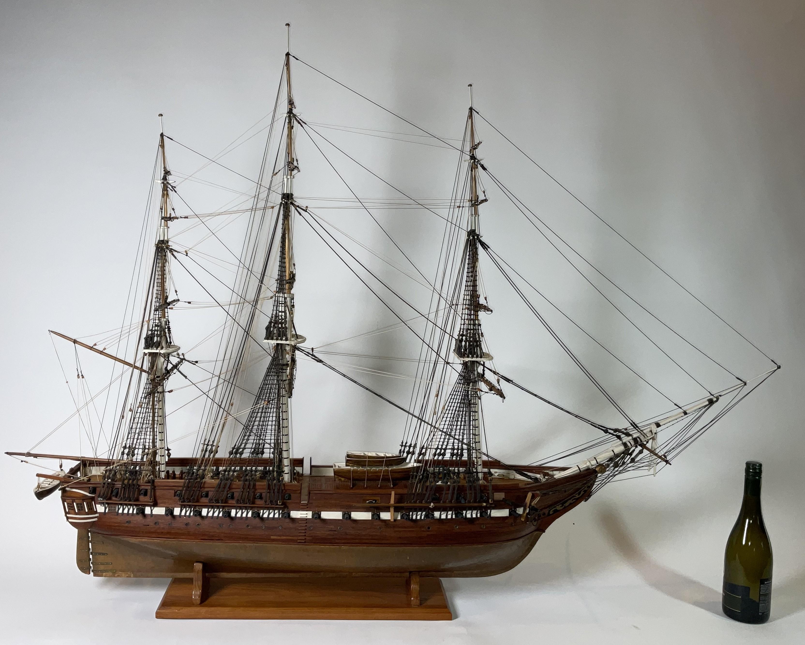 Fine scale model of the American frigate USS Constitution. Planked hull with varnish finish. Clove hitched shrouds, quarter galleries, rigged cannon etc. No case. 

Weight:    26 lbs.
Overall Dimensions:    42