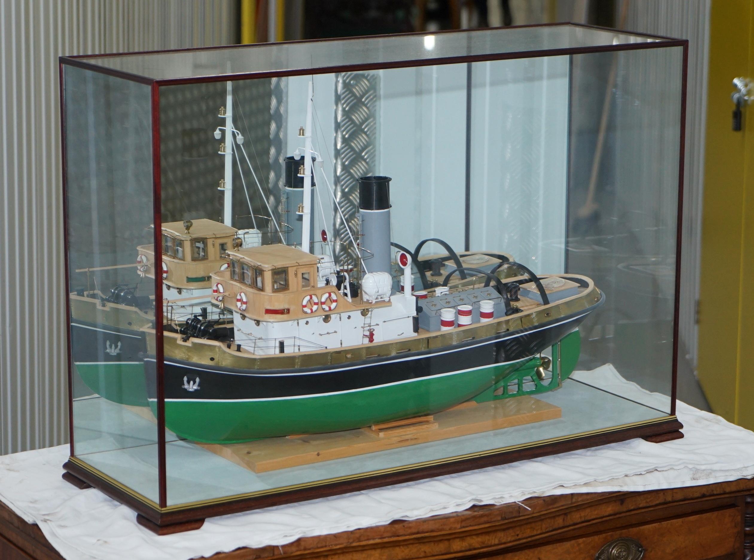 We are delighted to offer for sale this lovely very large Anteo Tugboat in a mahogany and glass exhibition case

A very large scaled decorative piece, the case alone must have cost a small fortune, it is exquisite quality and genuinely would have