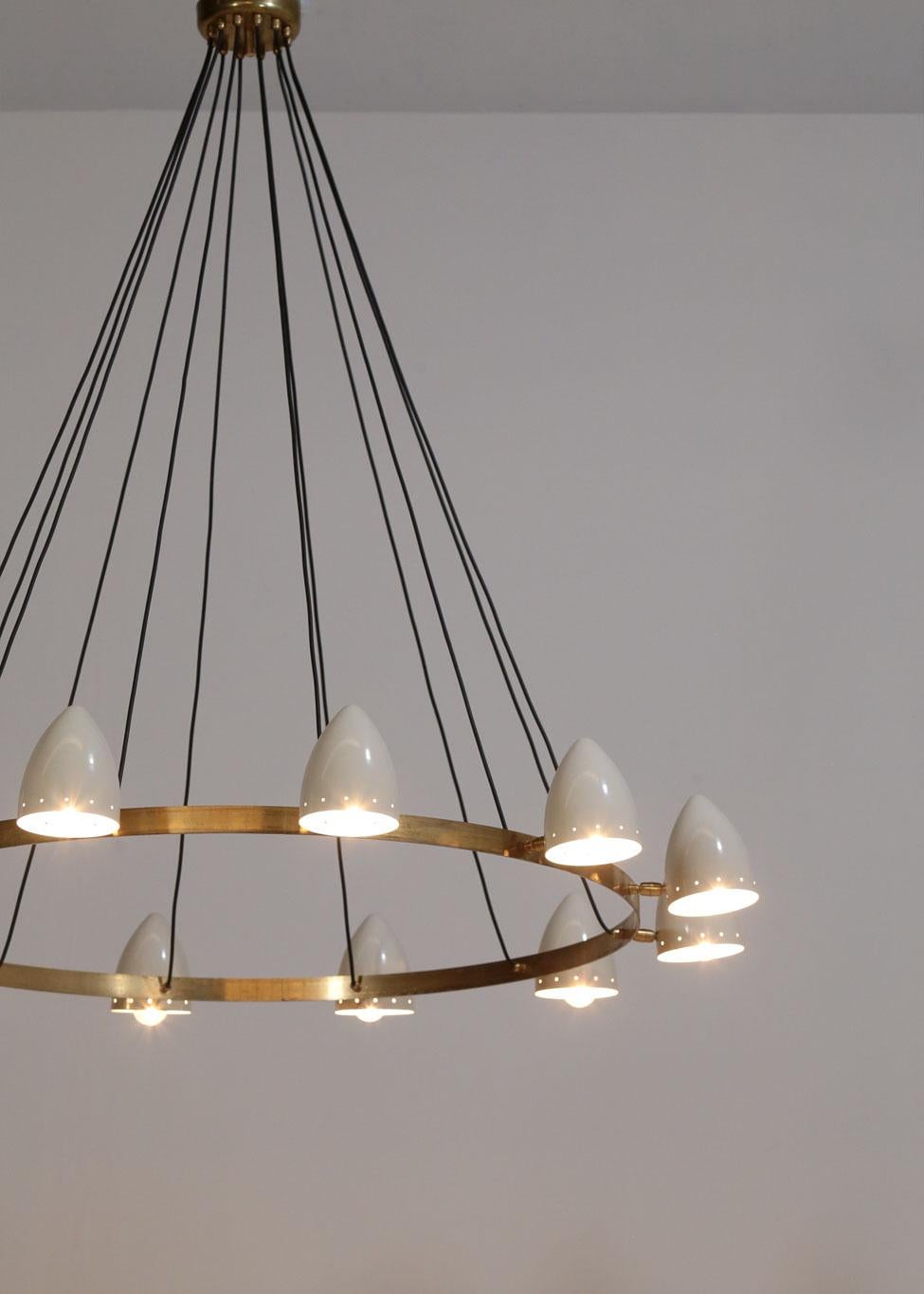 Really nice modern chandelier, structure in brass with 12 opalines globes.
Chandelier in the style of Stilnovo. 
Artisanal work.
E14 bulb

Choose your own diameter and height on request.