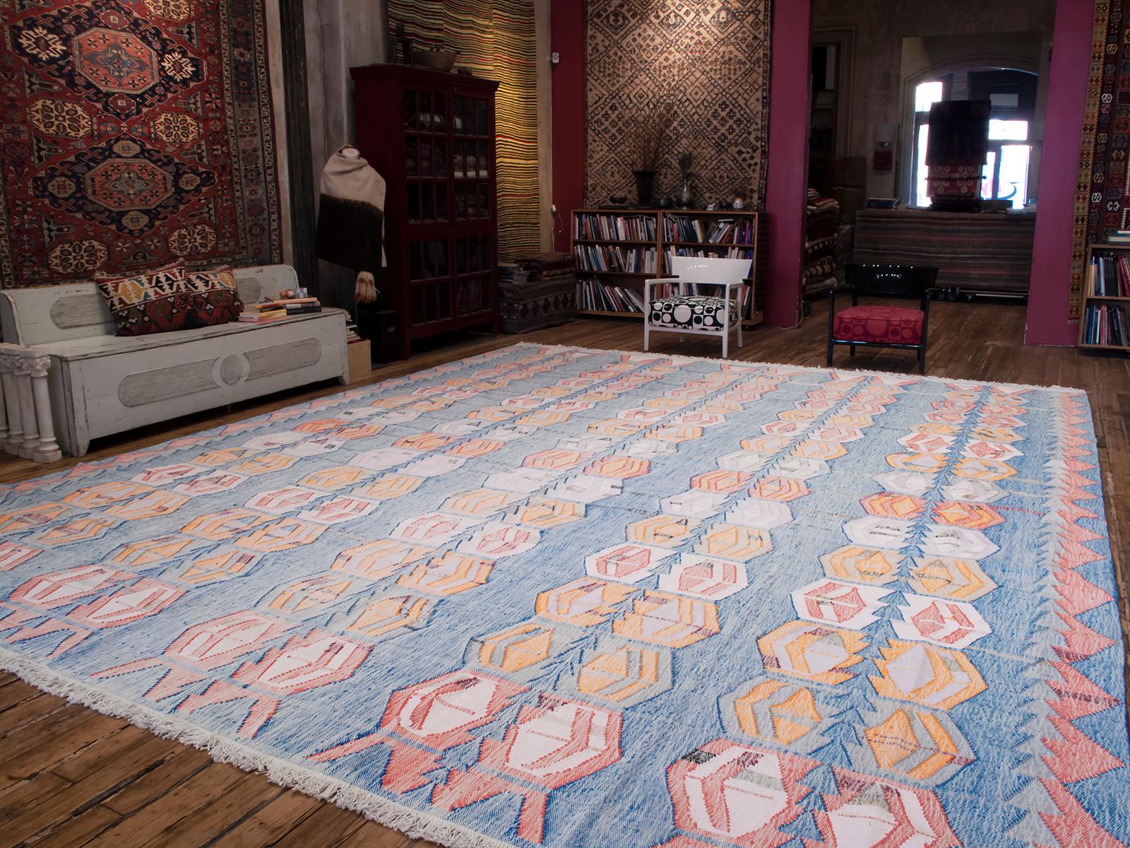 A large modern kilim woven with upcycled cotton rag with a design inspired by antique Anatolian kilim. Custom orders are available. Please inquire.