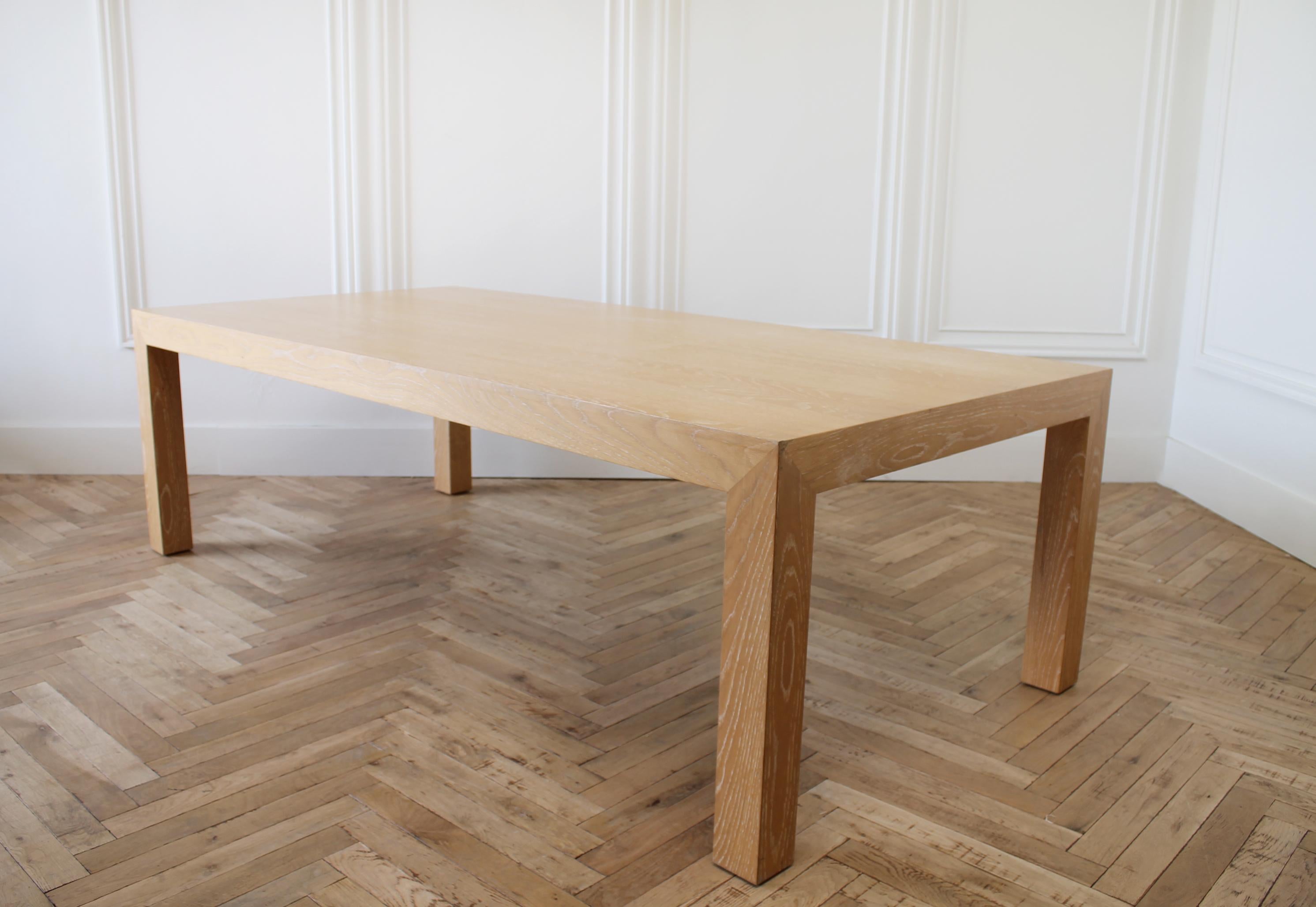Large modern custom made oak dining table.
Table has light oak veneers, this was a showroom sample. May show signs of scuffs, use etc. See our photos. This table is solid and sturdy, ready for everyday use.
Measures: 94.5