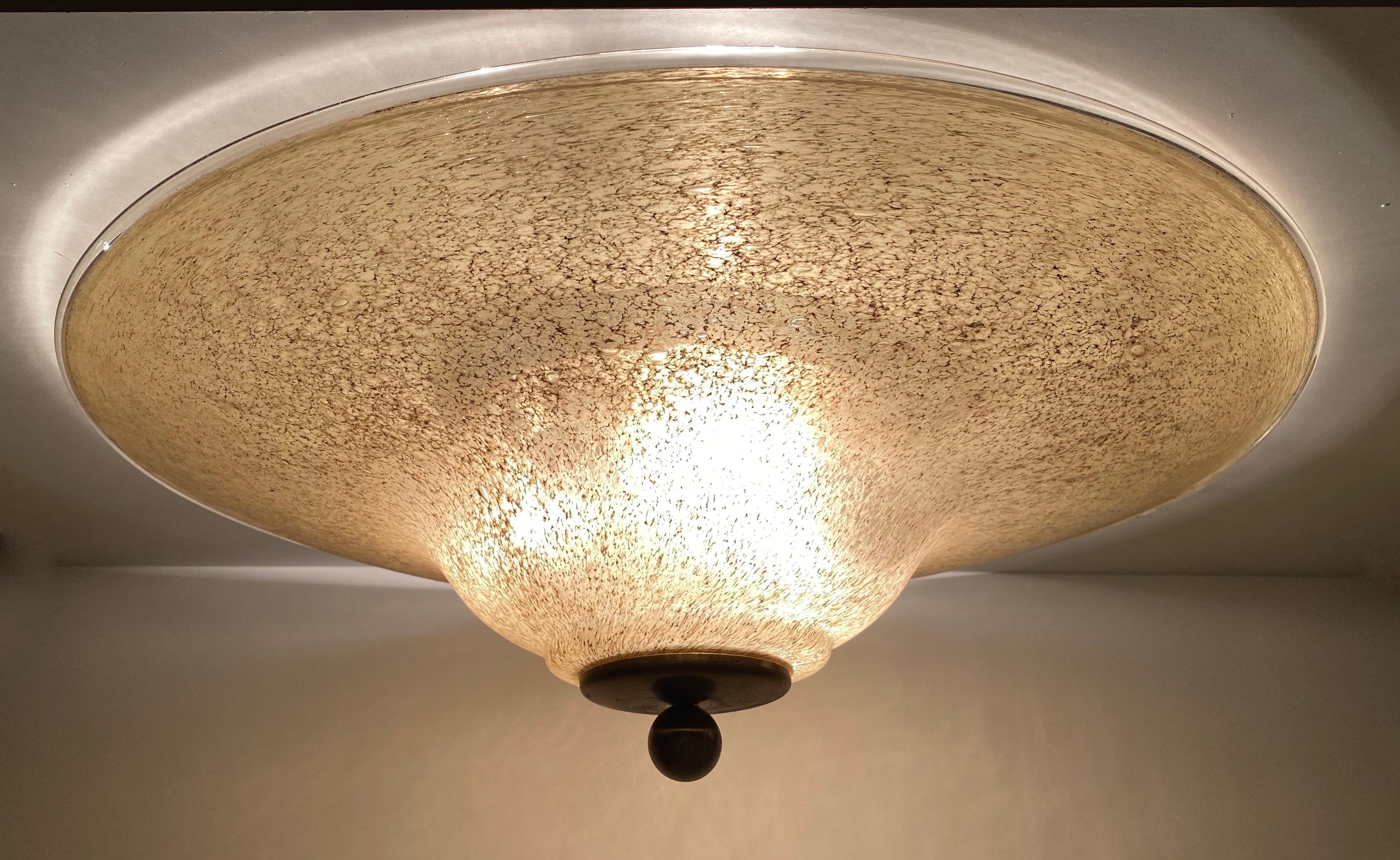 Gorgeous glass flush mount light made by Doria Leuchten, Germany. It is in very good condition, no chips, cracks and no repairs. The fixture requires three European E27 / 110 volt edison bulbs, each bulb up to 60 watts. It is marked with a label