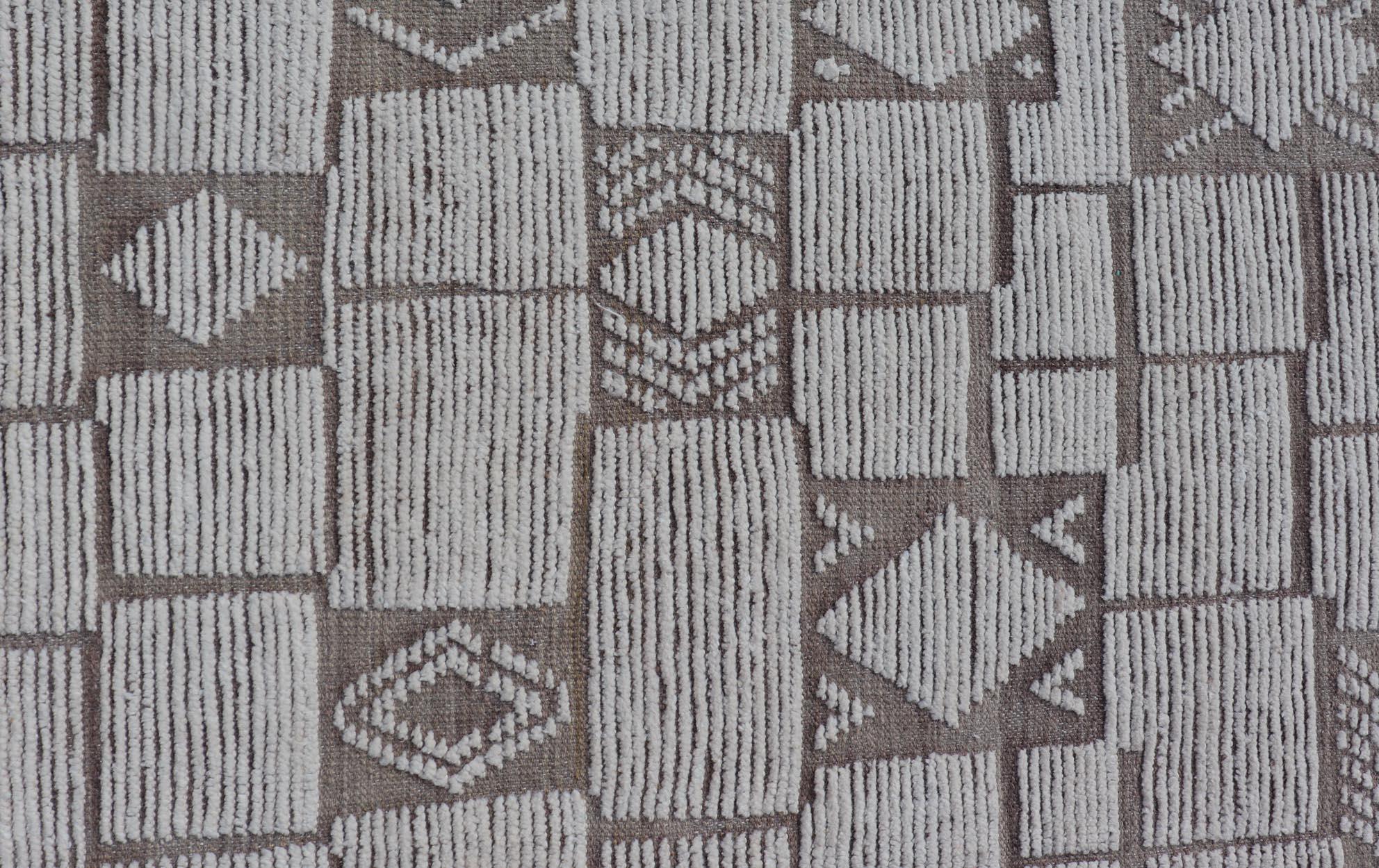 Large Modern Hand-Knotted Moroccan Rug in Wool with Sub-Geometric Design. Keivan Woven Arts; rug MSE-12553, country of origin / type: Afghanistan / Modern Casual, circa Early-21th Century.
Measures: 11'6 x 18'3 
This modern casual tribal rug has