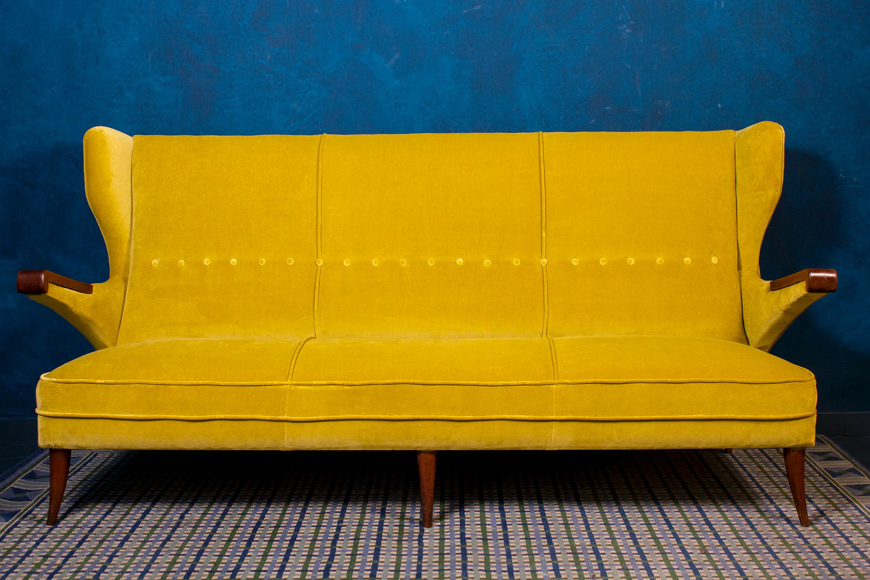 Amazing Mid-Century Italian Canapè or Sofa with wood legs and arms .
 Acid green new upholstery in perfect condition.