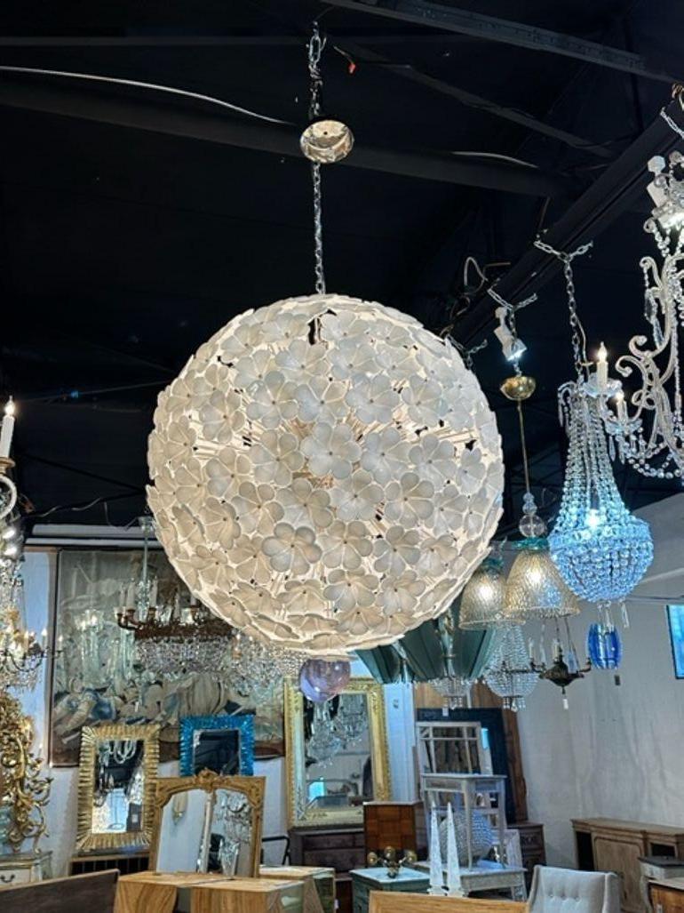 Spectacular large scale modern Murano glass chandelier with hibiscus flowers. A true work of art that takes your breath away. Gorgeous!!
Over 500 chandeliers in stock. We make custom Murano glass chandeliers in Italy. All styles, colors, shapes and