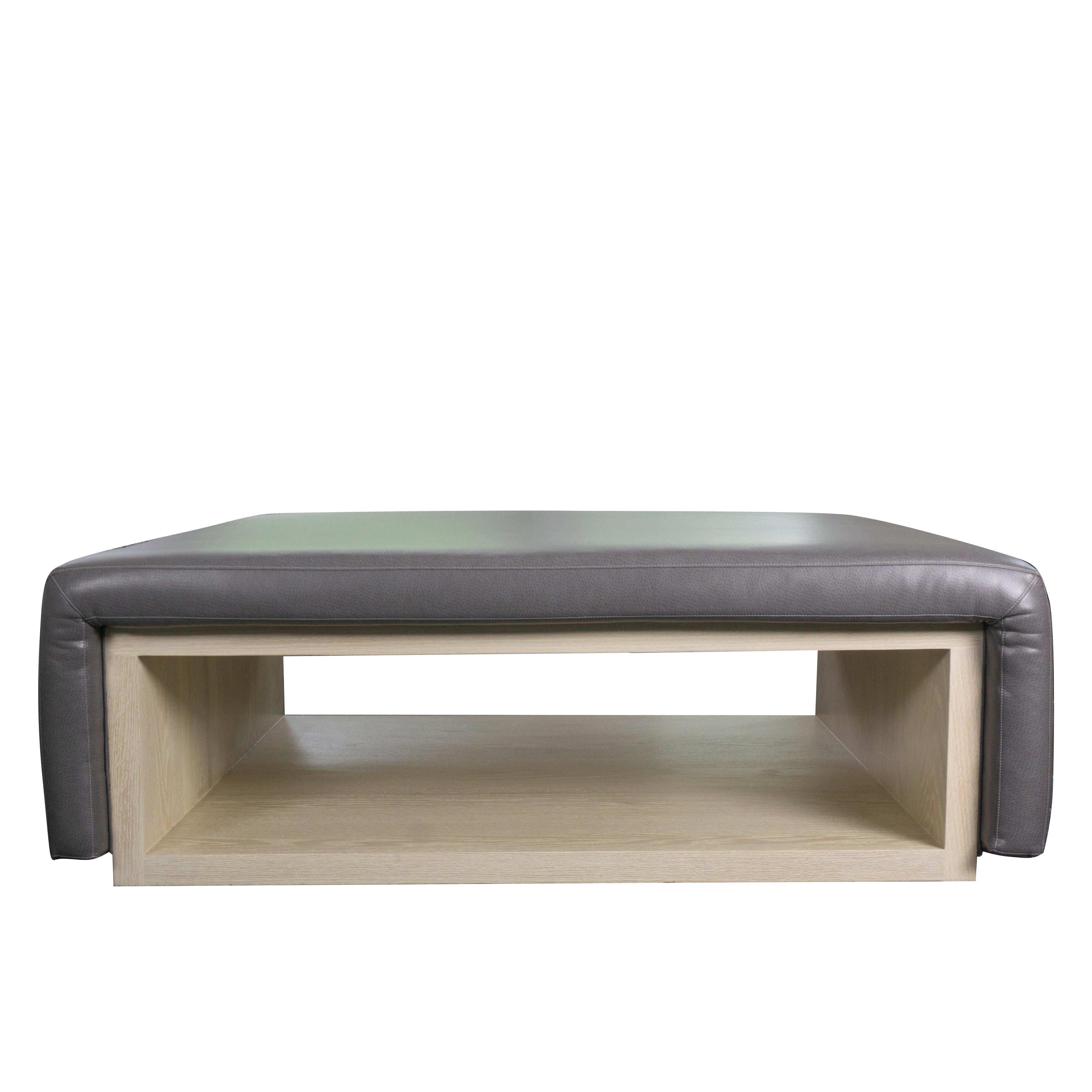 Our Funda ottoman can be custom built to fit perfectly within your living space. It’s functional yet modern design features an open cubby for storage and a soft padded exterior. The ottoman shown has vinyl upholstery but can be made in customers’