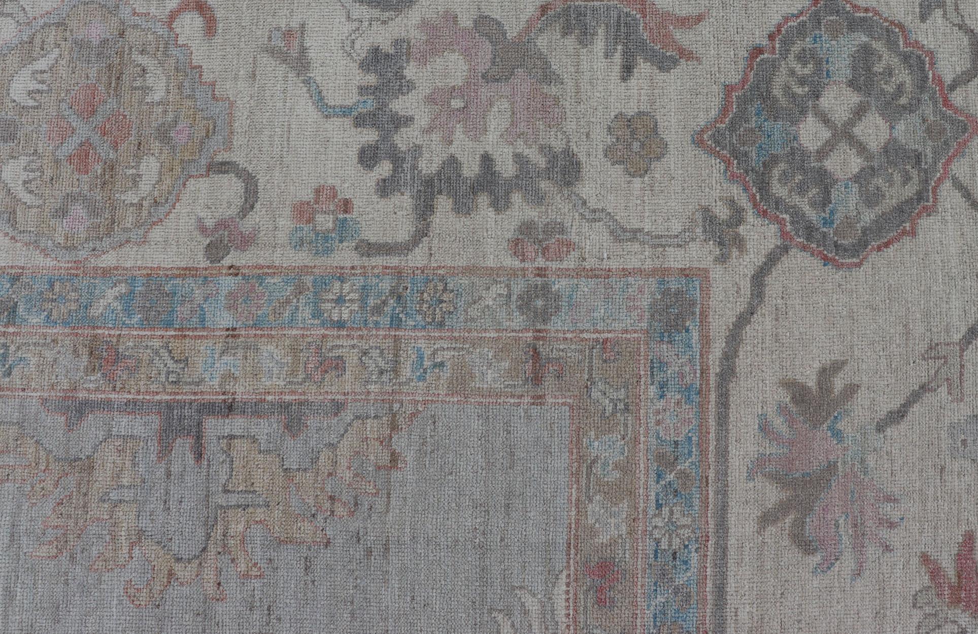 Large Oushak Rug with Floral Motifs & Muted Colorful Tones on Neutral Background For Sale 11