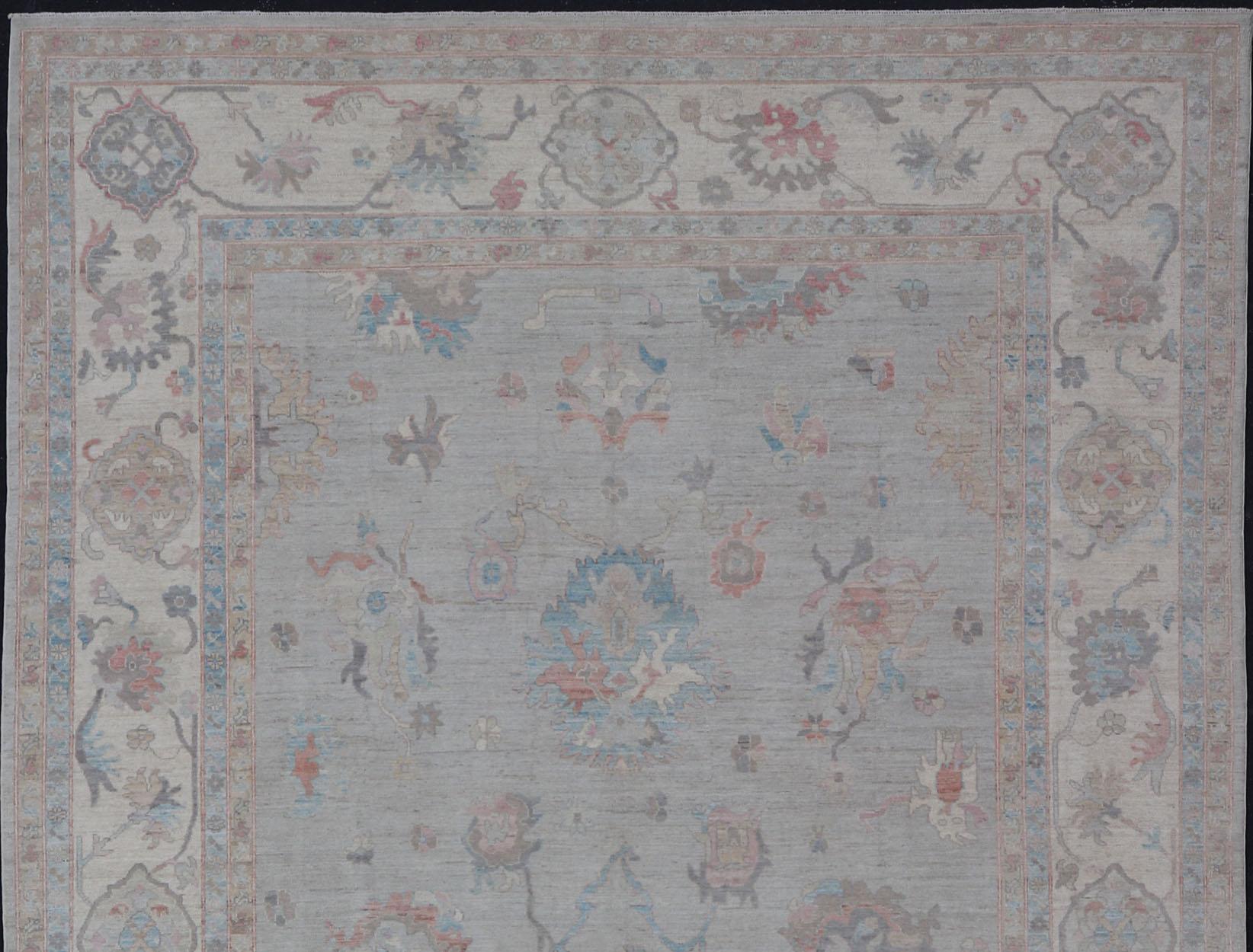 Contemporary Large Oushak Rug with Floral Motifs & Muted Colorful Tones on Neutral Background For Sale