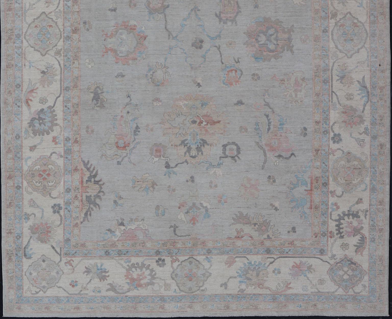 Large Oushak Rug with Floral Motifs & Muted Colorful Tones on Neutral Background For Sale 1