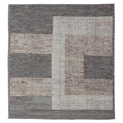 Grand tapis moderne dans des tons terreux avec une taille carrée et une texture vieillie