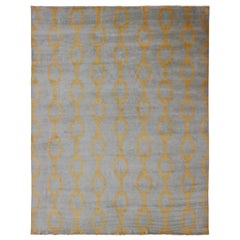 Grand tapis moderne avec motif de chaîne en gris et or jaune