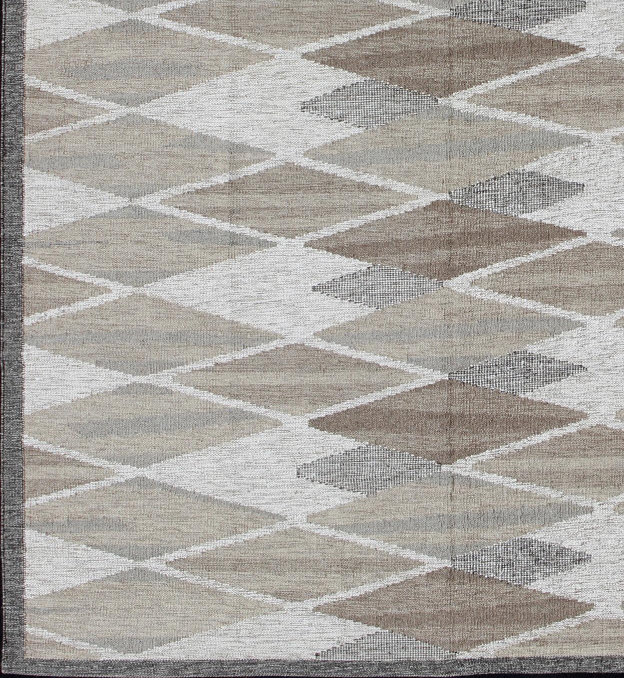 Modern design Scandinavian Flat weave Rug in All Over Diamond Motifs, Rug/KHN-504-SW-03, Modern Interiors, Modern Rug 

This Scandinavian flat-weave rug is inspired by the work of Swedish textile designers of the early to mid-20th century. With a