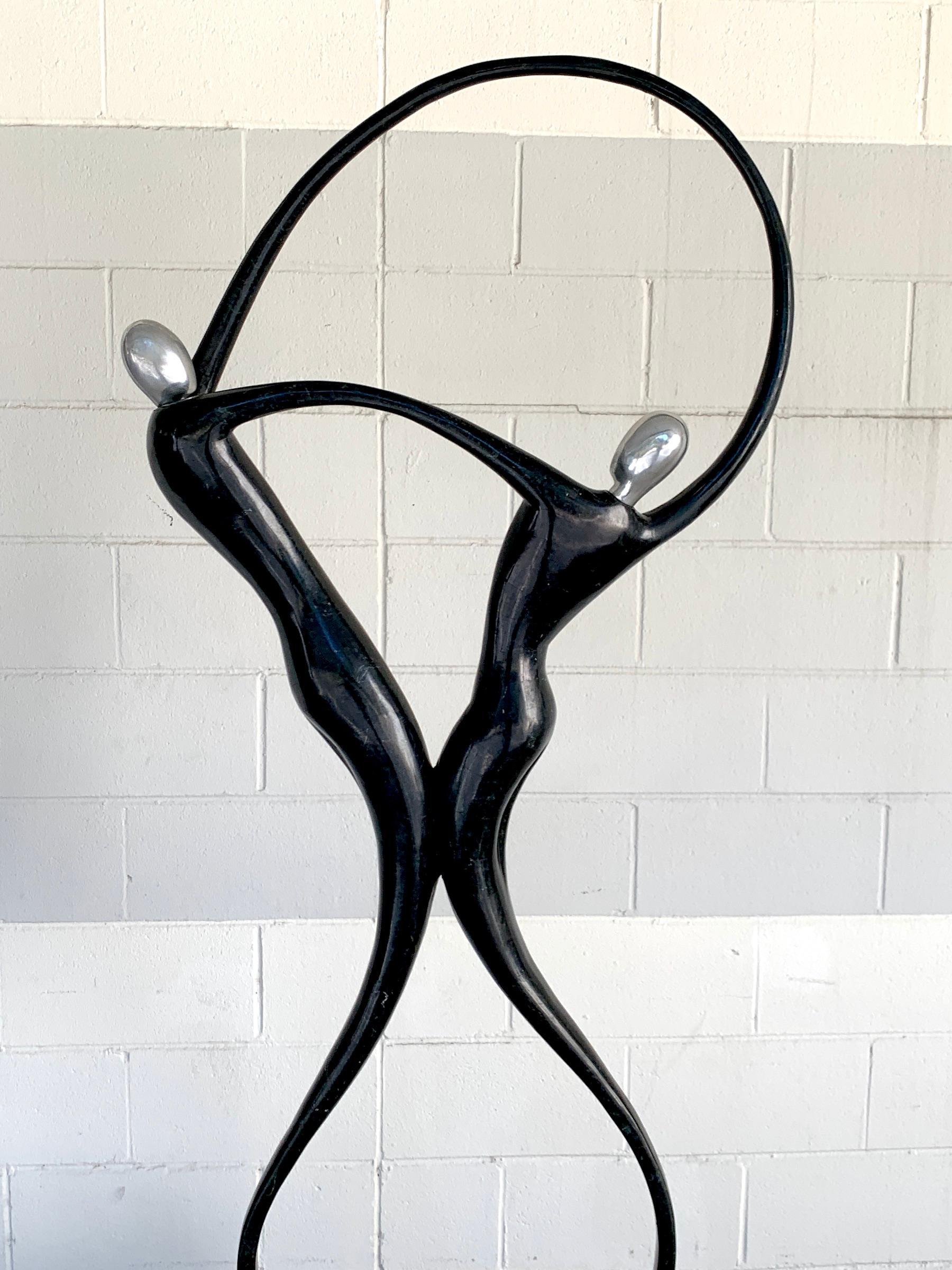 Large Modern Tessellated Stone and Chrome Modern Figural Sculpture 6