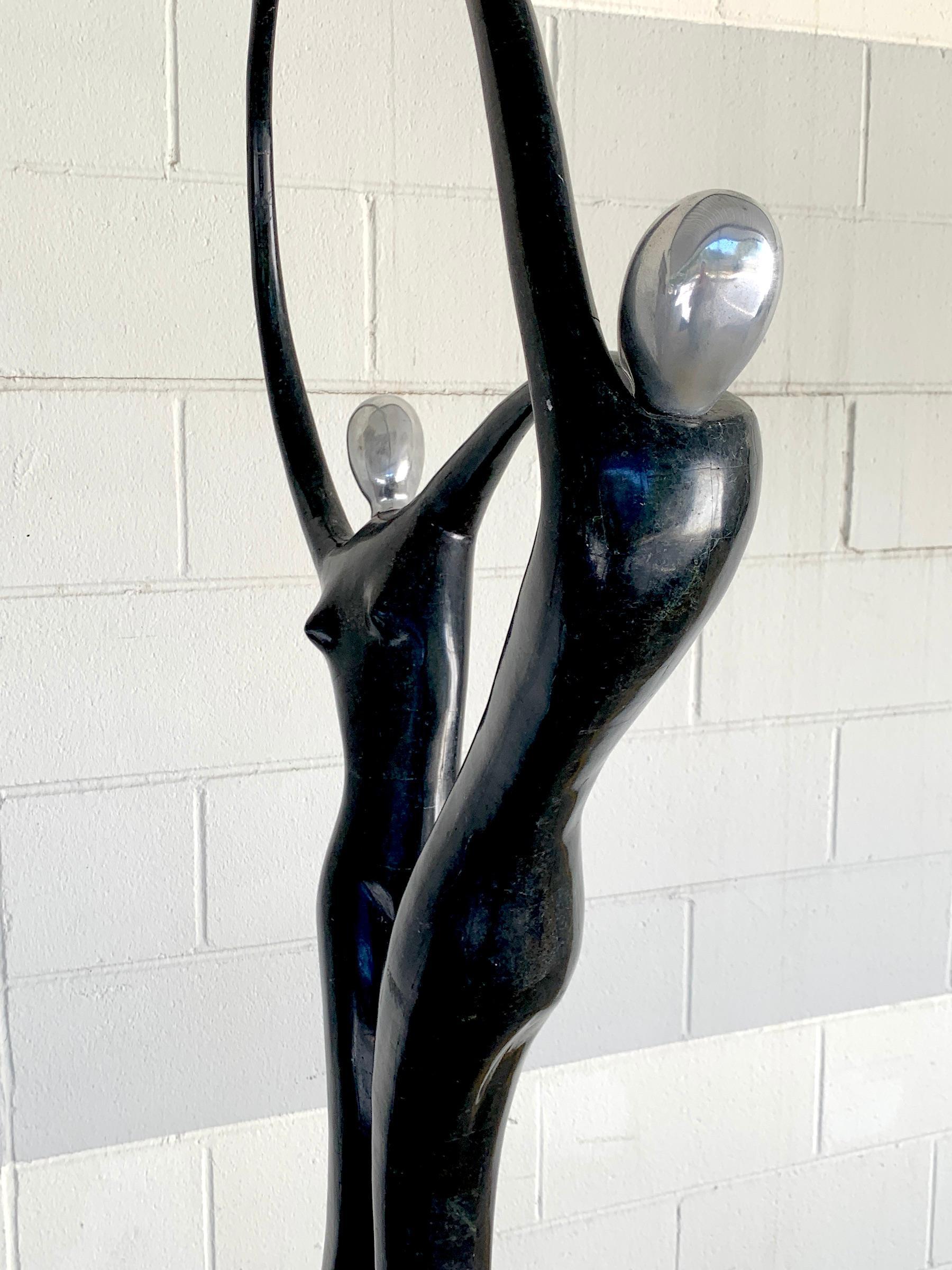 Large Modern Tessellated Stone and Chrome Modern Figural Sculpture 9