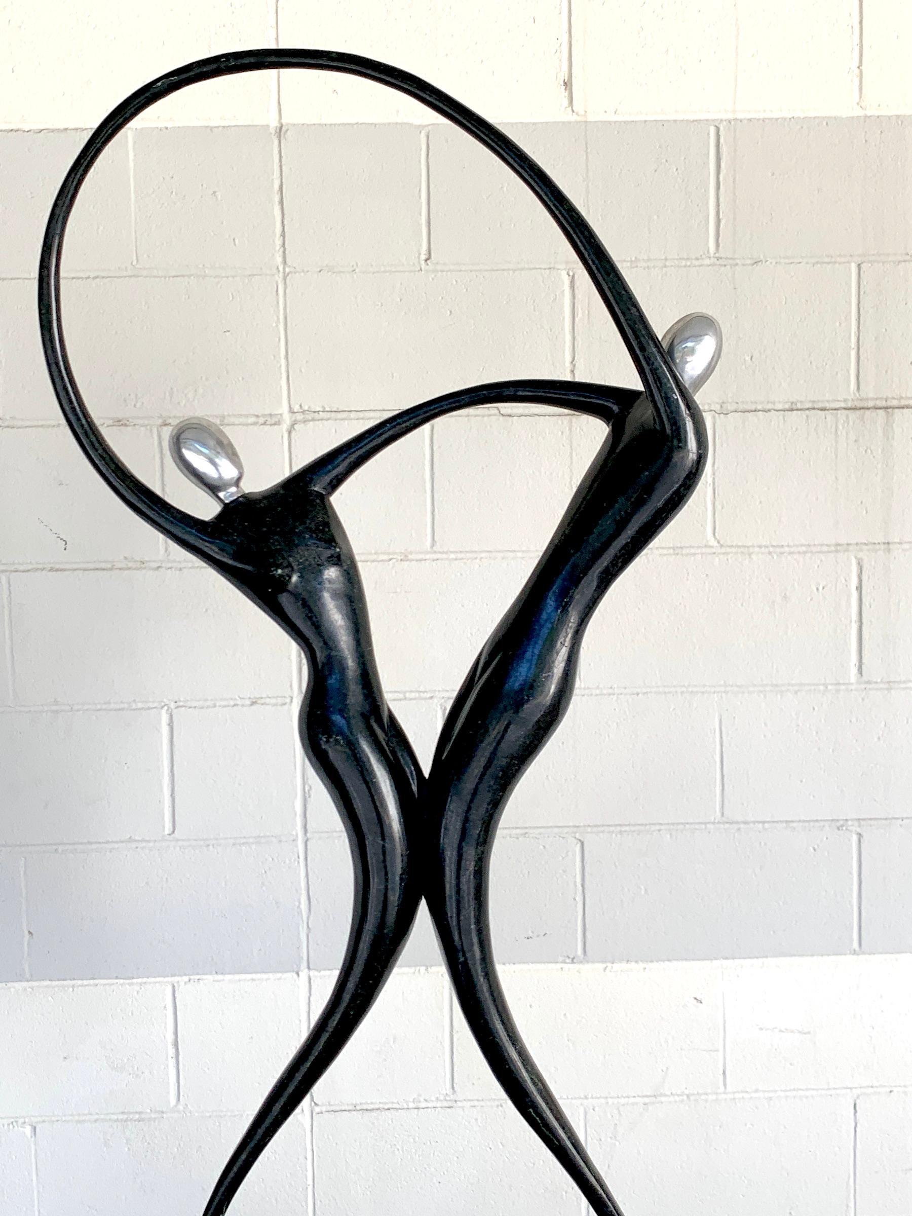 Large Modern Tessellated Stone and Chrome Modern Figural Sculpture In Good Condition In West Palm Beach, FL