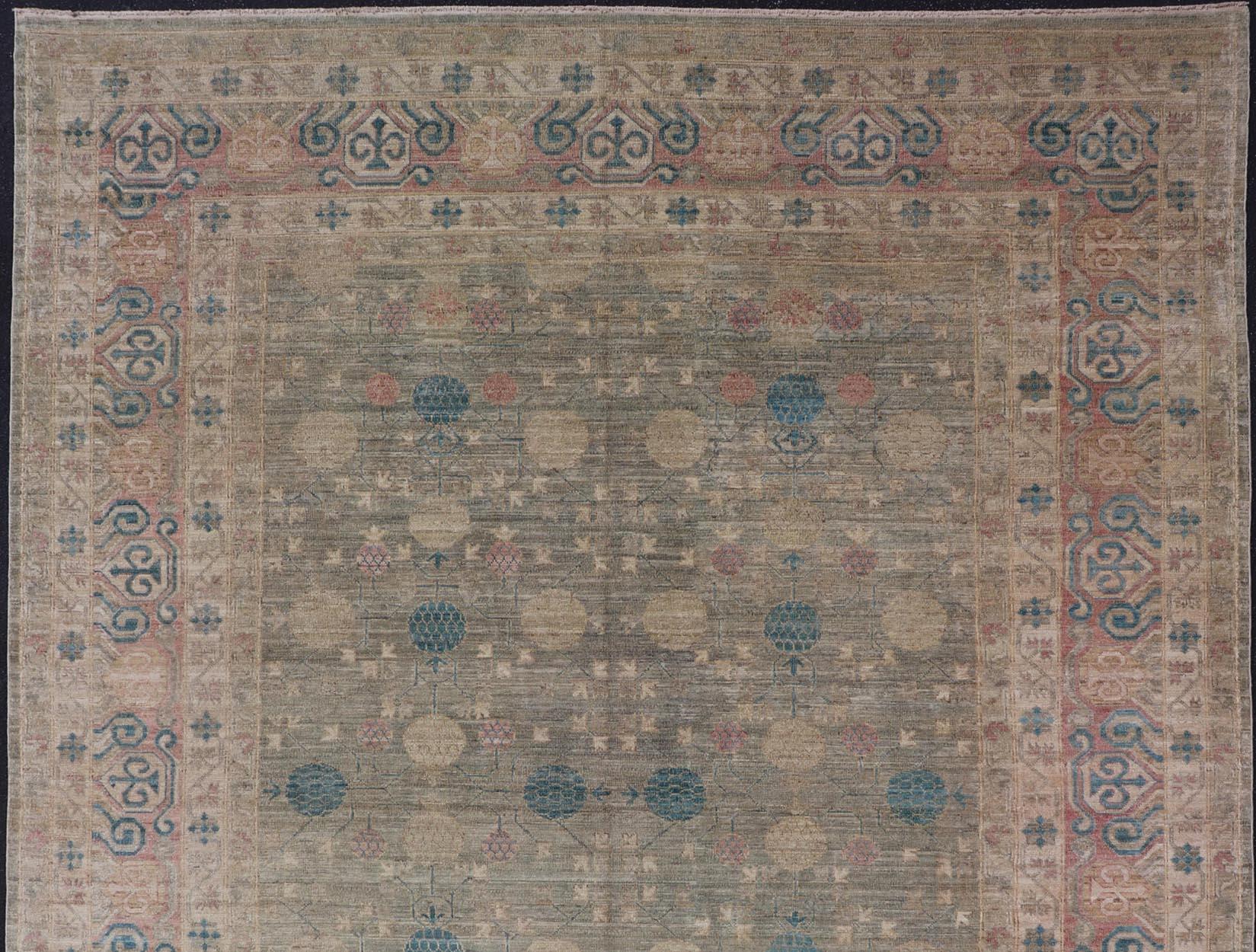 Afghan Large Modern Tribal Khotan Rug in Shades of Cream, Green, Blue, and Coral For Sale