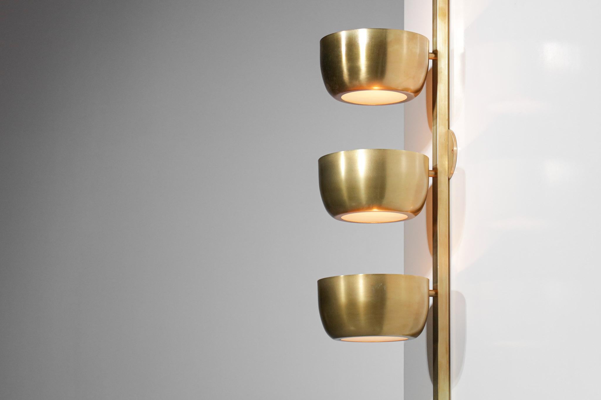 Imposing pair of modern Italian wall lights with vintage design from the 60s. Structure and cups in solid brass, possibility to choose the finish on request. Handcrafted.
         