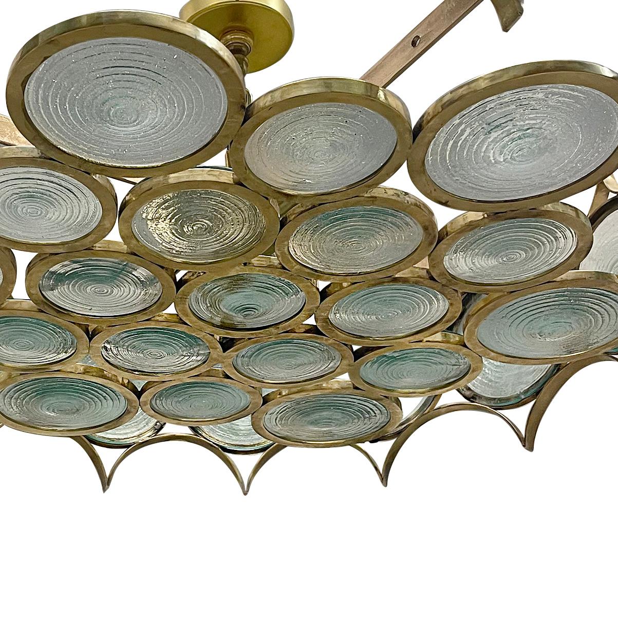 Moderne style circa 1960's Italian polished bronze light fixture with convex molded glass insets.

Measurements:
Diameter: 38