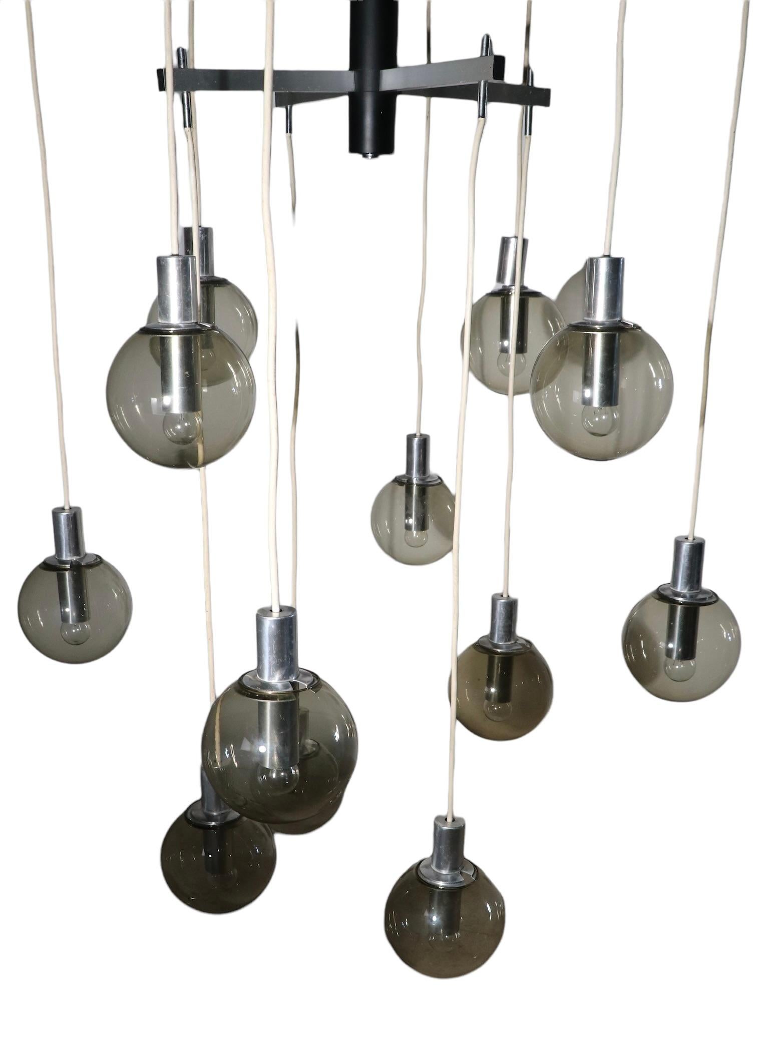 Large Modernist 12 Light Chandelier with Tinted Glass Ball Shades Ca. 1970's For Sale 12