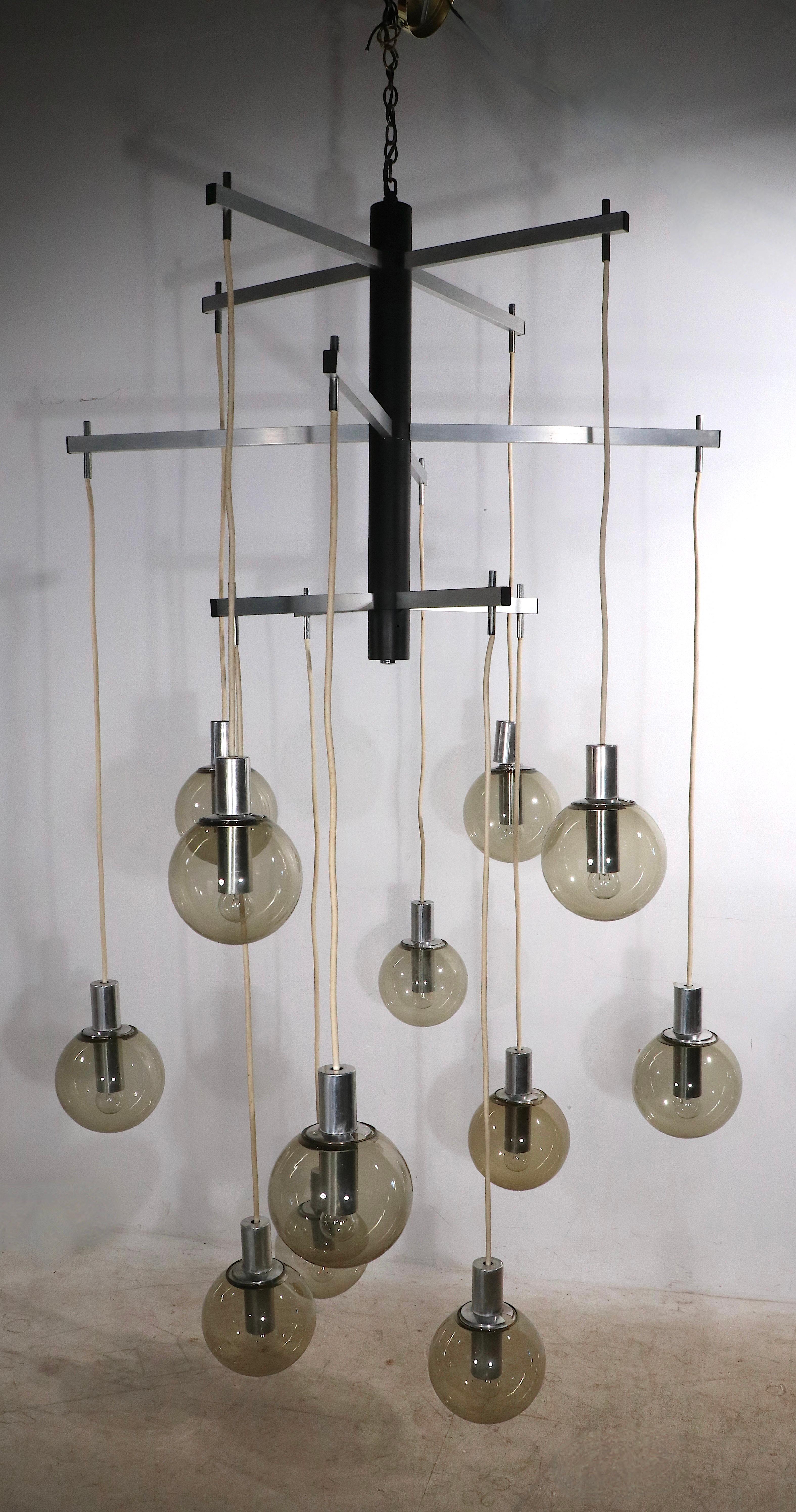 International Style Large Modernist 12 Light Chandelier with Tinted Glass Ball Shades Ca. 1970's For Sale