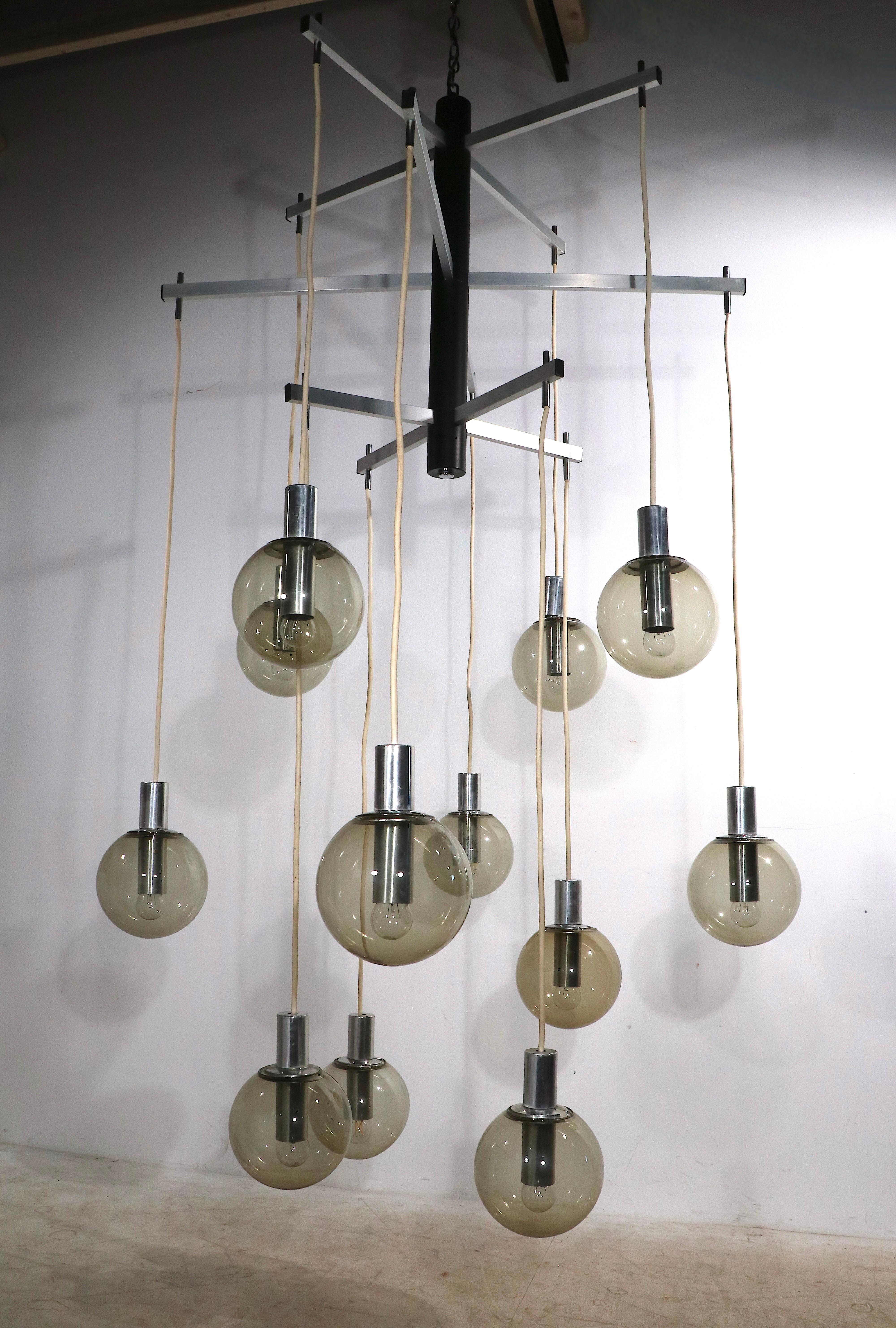 American Large Modernist 12 Light Chandelier with Tinted Glass Ball Shades Ca. 1970's For Sale