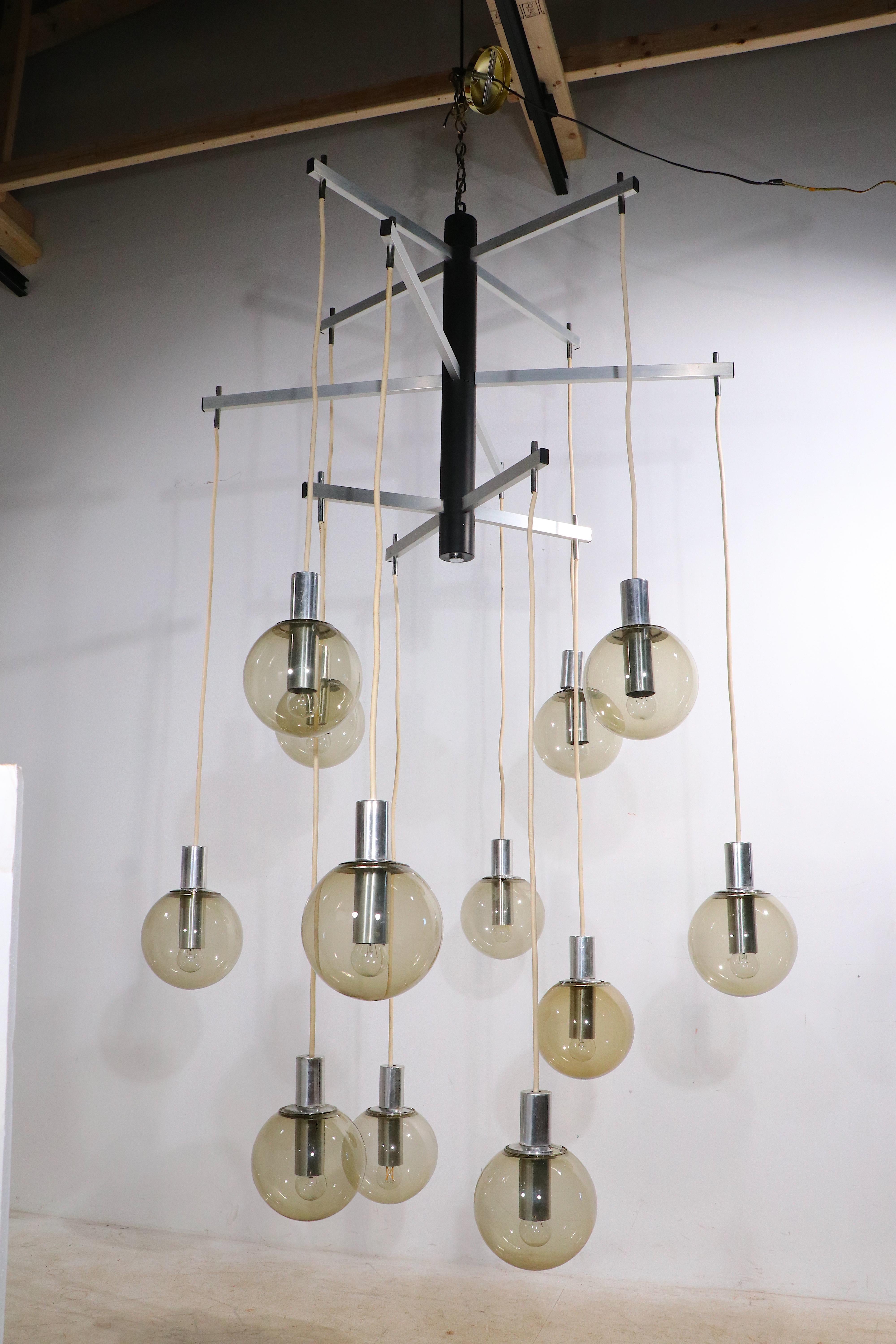 Large Modernist 12 Light Chandelier with Tinted Glass Ball Shades Ca. 1970's For Sale 1