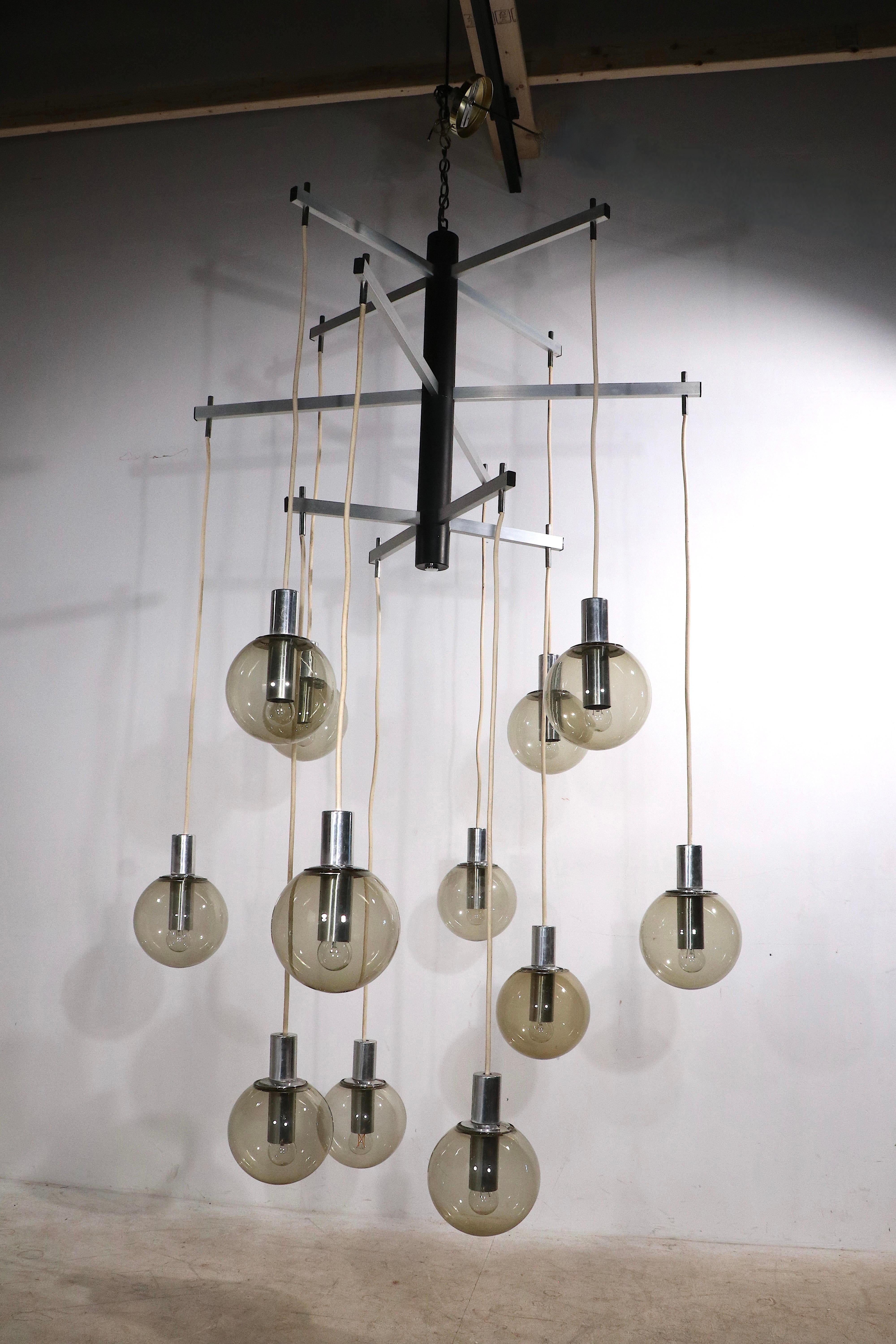 Large Modernist 12 Light Chandelier with Tinted Glass Ball Shades Ca. 1970's For Sale 2