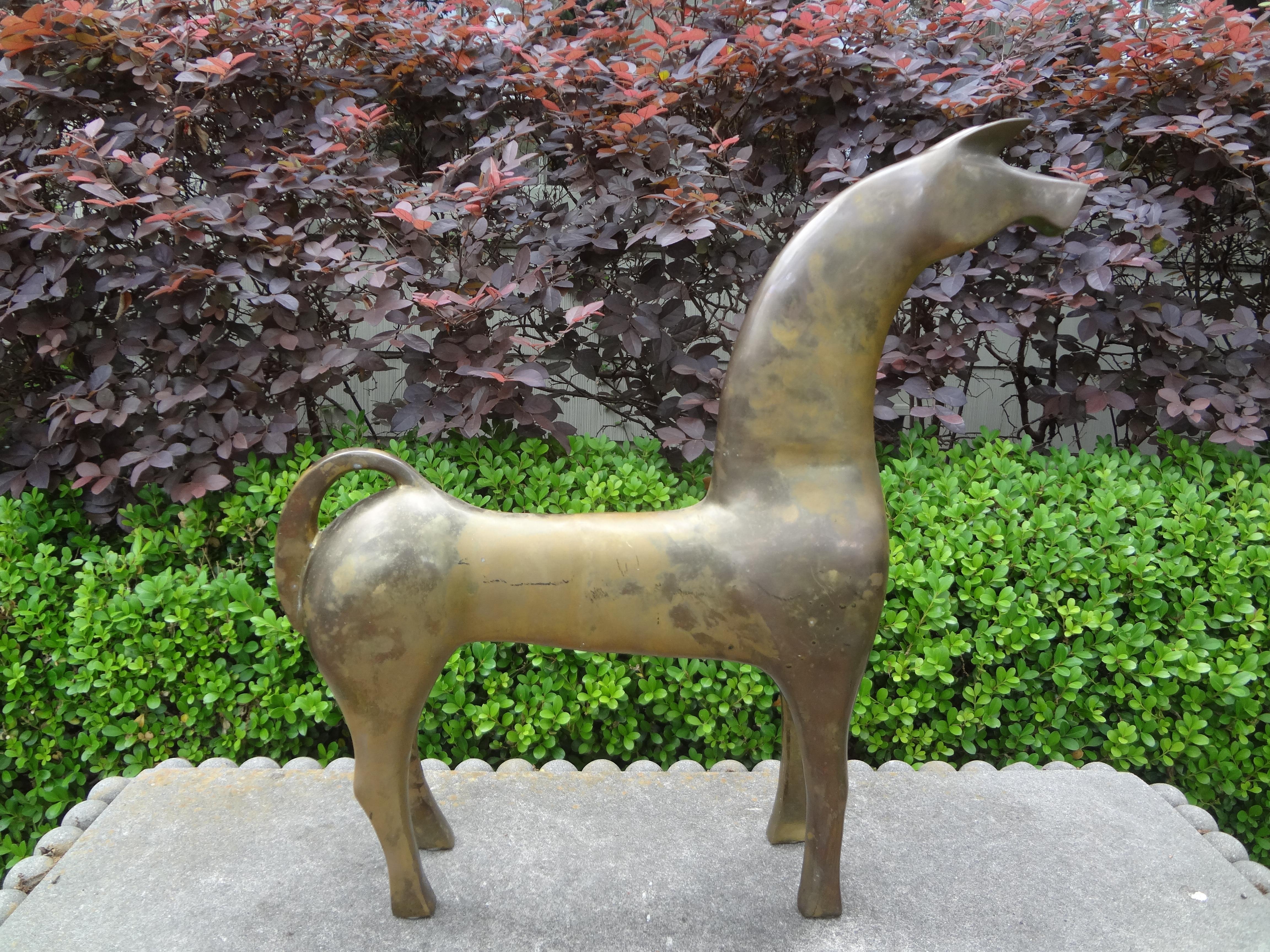 Large Modernist Etruscan brass horse sculpture.
Stunning large Gio Ponti inspired Modernist Etruscan brass horse sculpture. Our Mid-Century Modern brass horse figure or sculpture stands in a sleek graceful almost cubist style.
Fantastic bookcase or