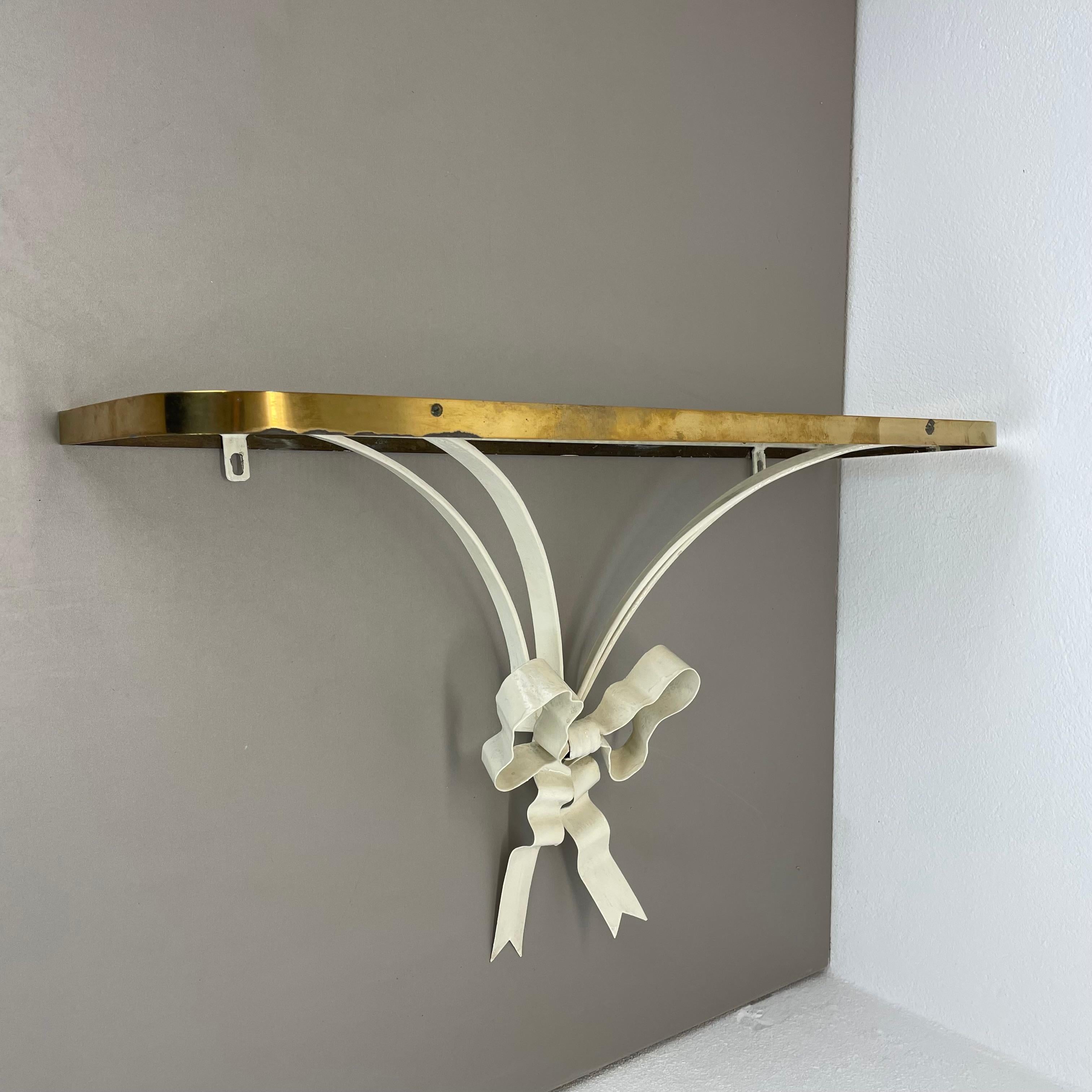 Article:

Wall board in style of Matégot



Origin:

France


Age:

1950s





This original vintage wall board was produced in the 1950s in France. It is made of solid metal in white lacquered tone with nice brass applications. This wall element
