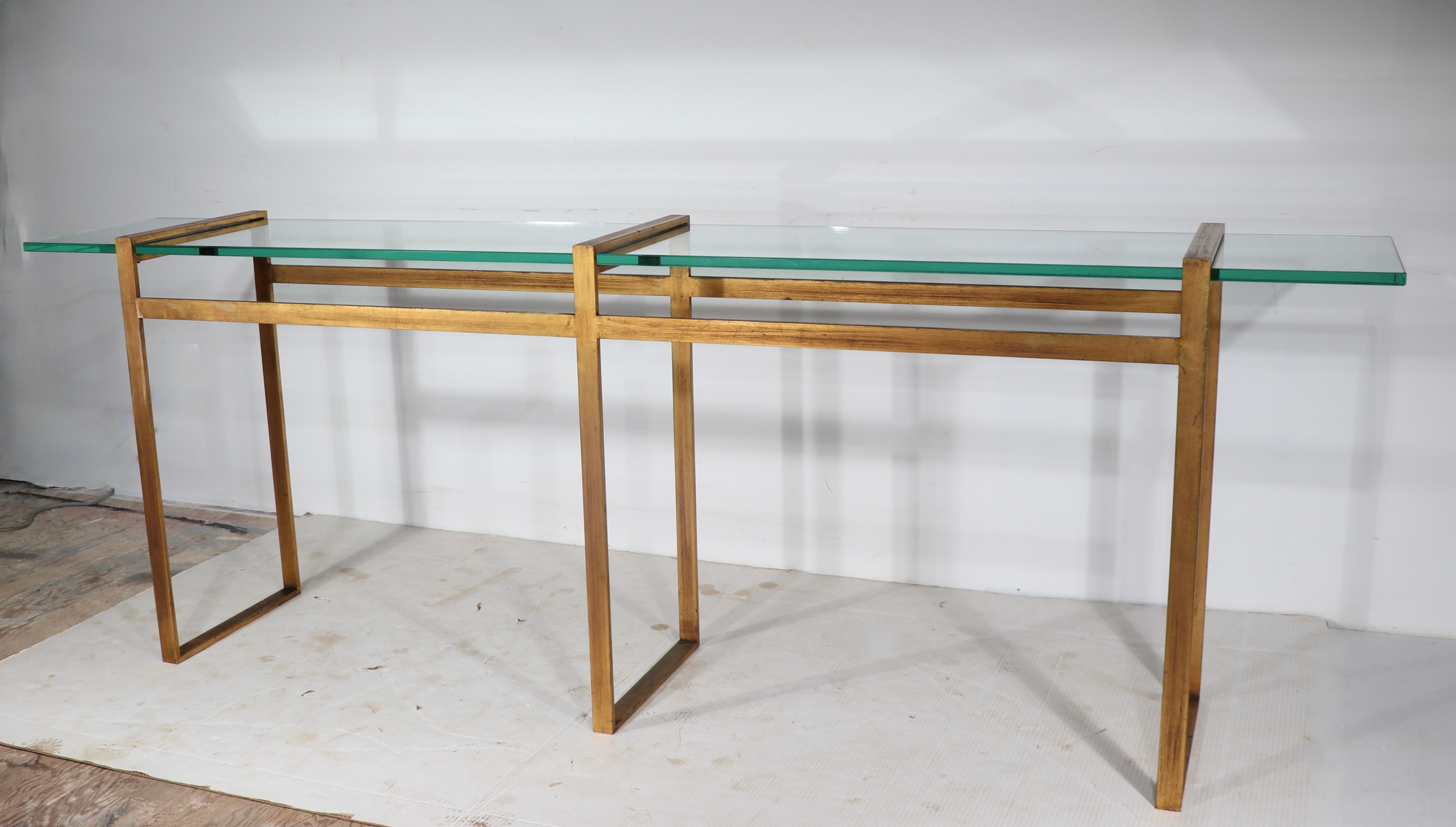 Hollywood Regency Large Modernist Metal and Glass Console in Faux Gilt Finish c 1970’s For Sale